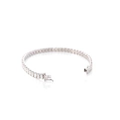 Pulsera de tenis de oro blanco de 14 quilates con moissanita engastada