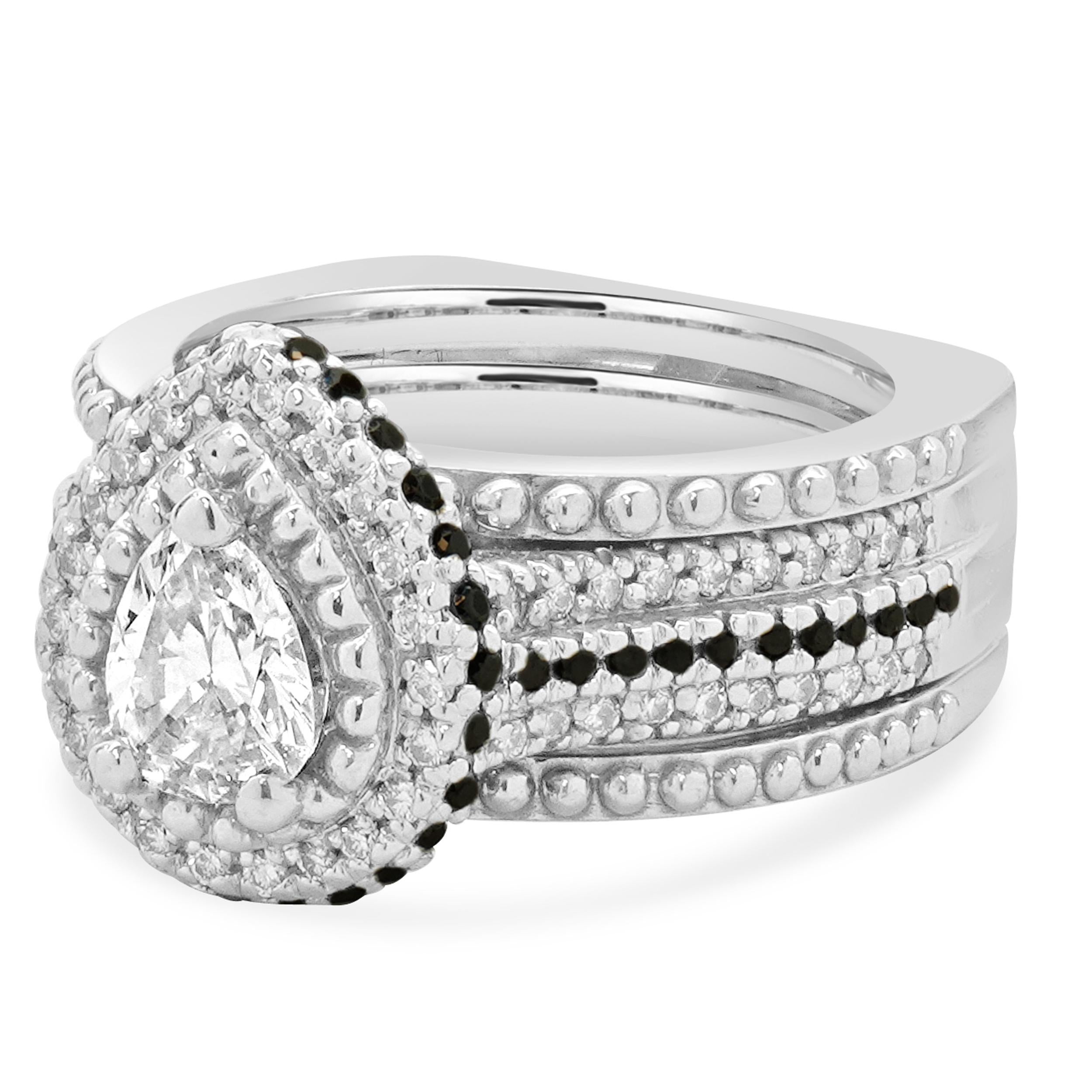 Matériau : Or blanc 14K
Diamant central : 1 taille poire = 0,70ct
Couleur : H
Clarté : VS2
Diamants : 62 taille ronde = 0,20cttw
Couleur : H
Clarté : SI1
Diamants : 48 taille ronde = 0,20cttw
Couleur : Noir
Taille de l'anneau : 5.5 (veuillez prévoir