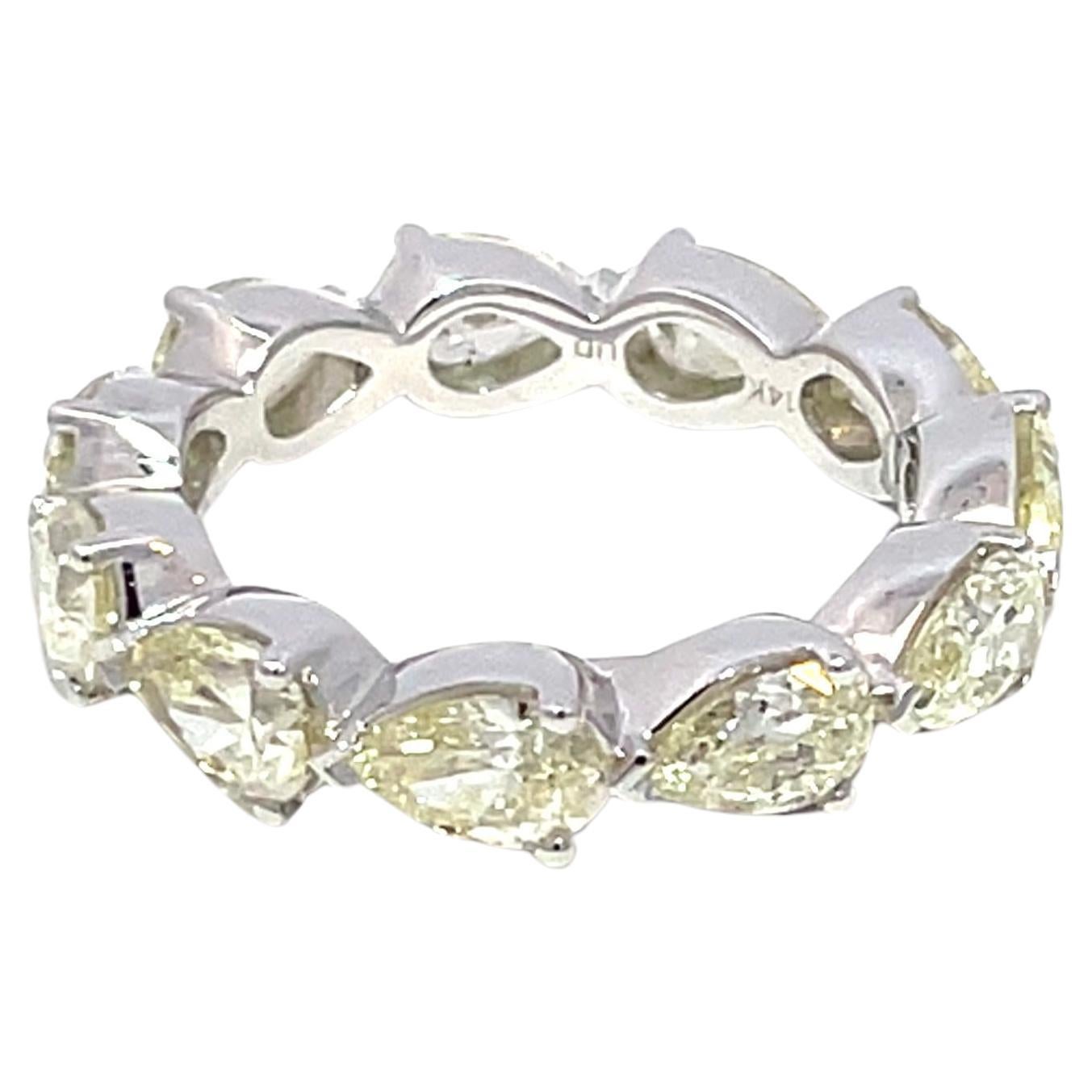 Fascia infinita con diamante a pera in oro bianco 14K
