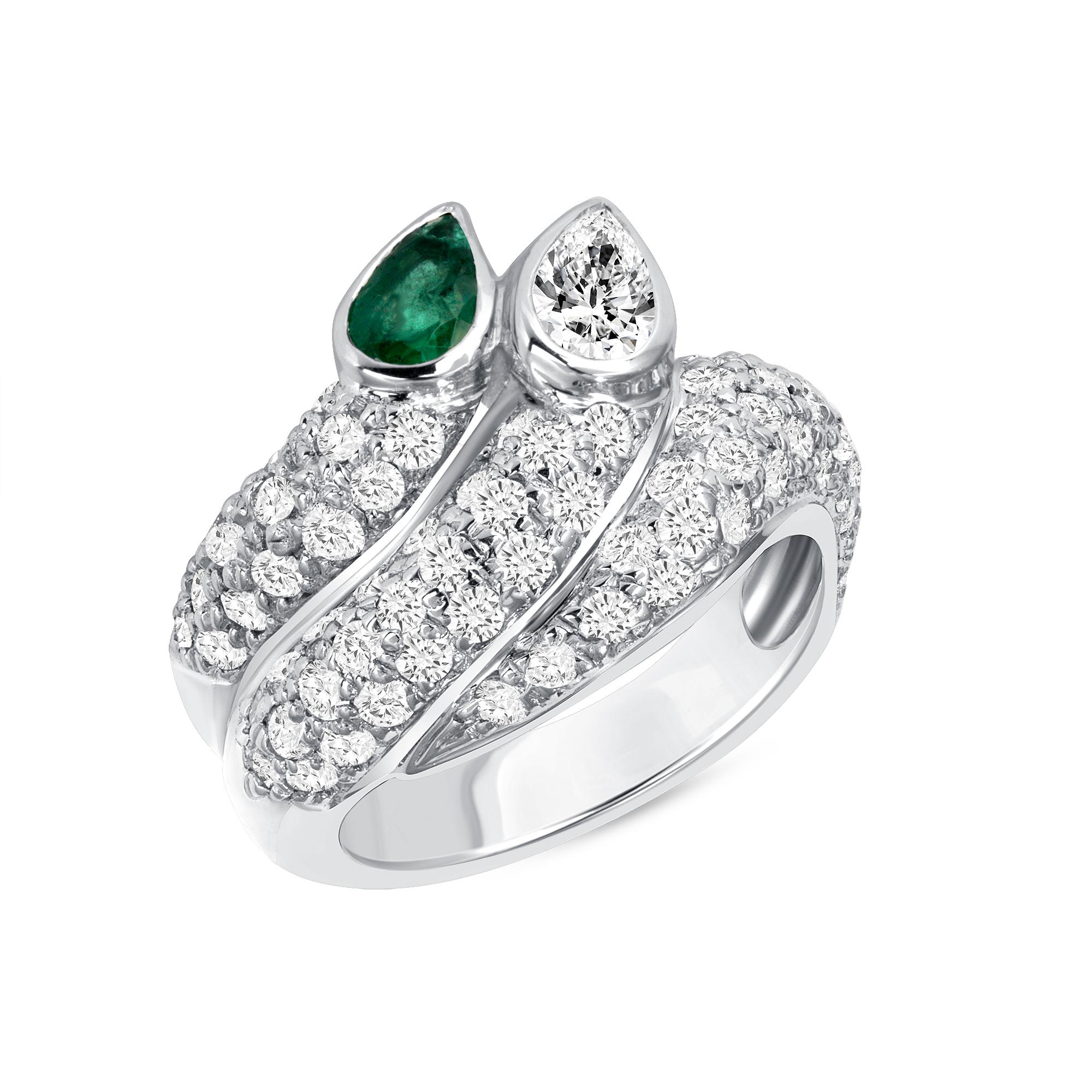 14K White Gold Ring 
1.20 Carate White Genuine Diamond
0.25 Carat Pear Shape Diamond in the center
.25 Carat Green Natural Emerald
Total Gold Weight: 9.7 Grams