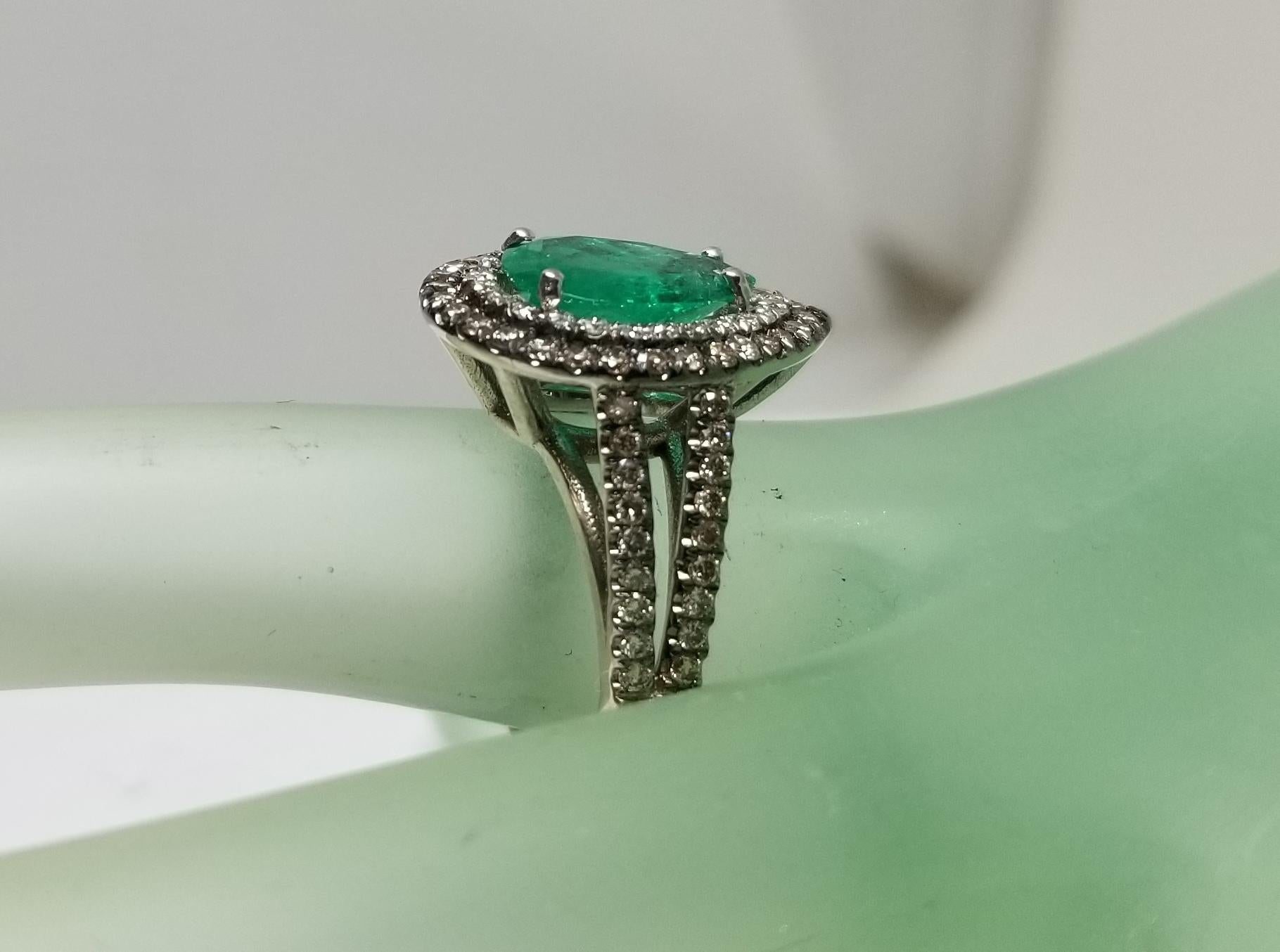 Women's or Men's 14 Karat White Gold Pear Shape Emerald and Diamond Double Halo Ring
