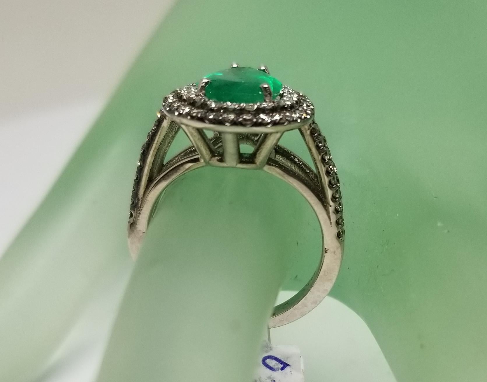 14 Karat White Gold Pear Shape Emerald and Diamond Double Halo Ring 1