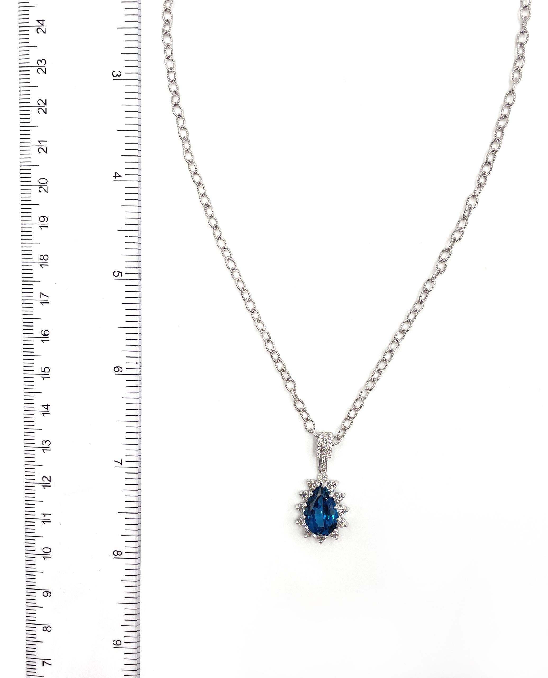 Starburst Pendant Necklace with Pear Shaped London Blue Topaz and Diamonds In New Condition For Sale In Old Tappan, NJ