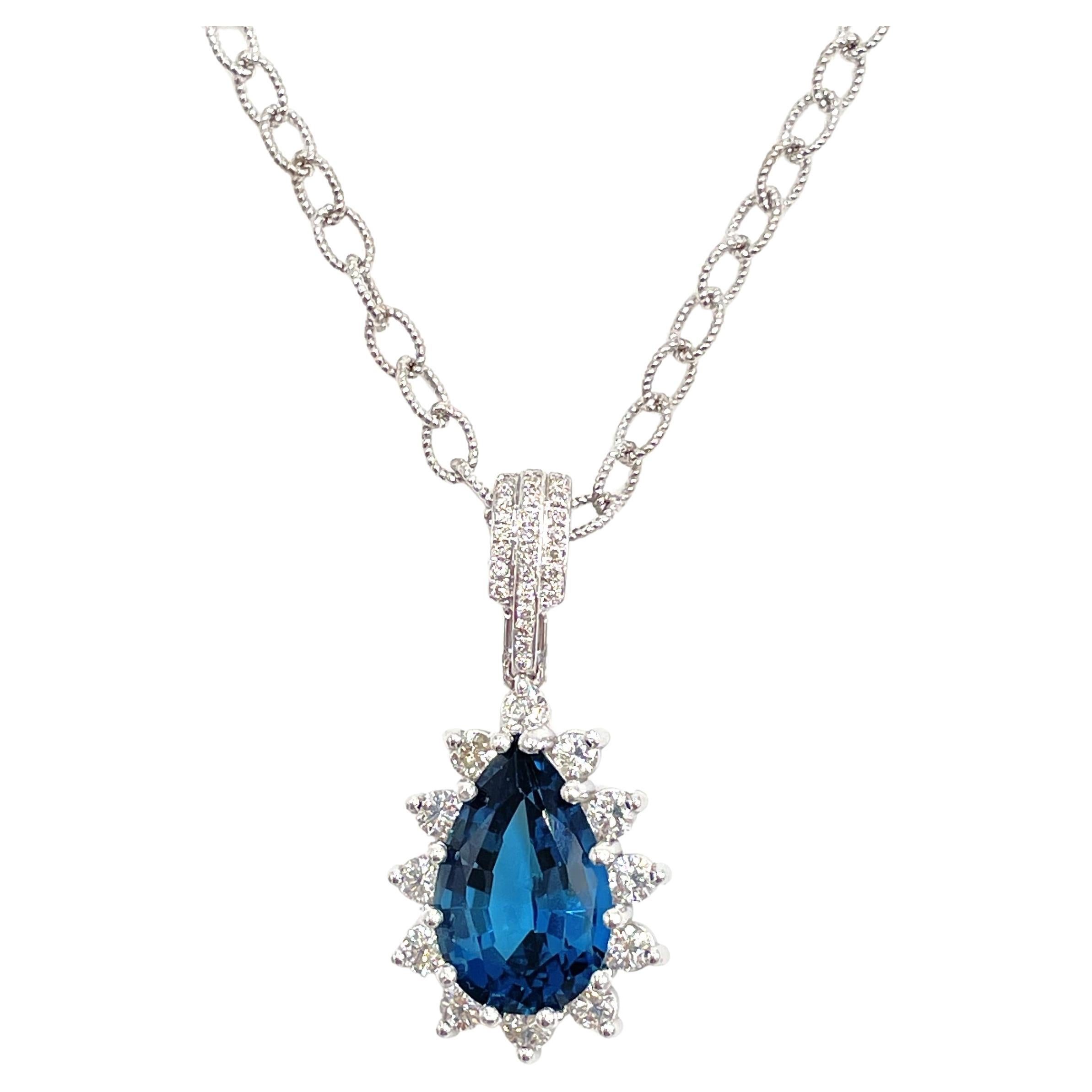 14K White Gold Pear Shape Pendant with London Blue Topaz and Diamonds For Sale