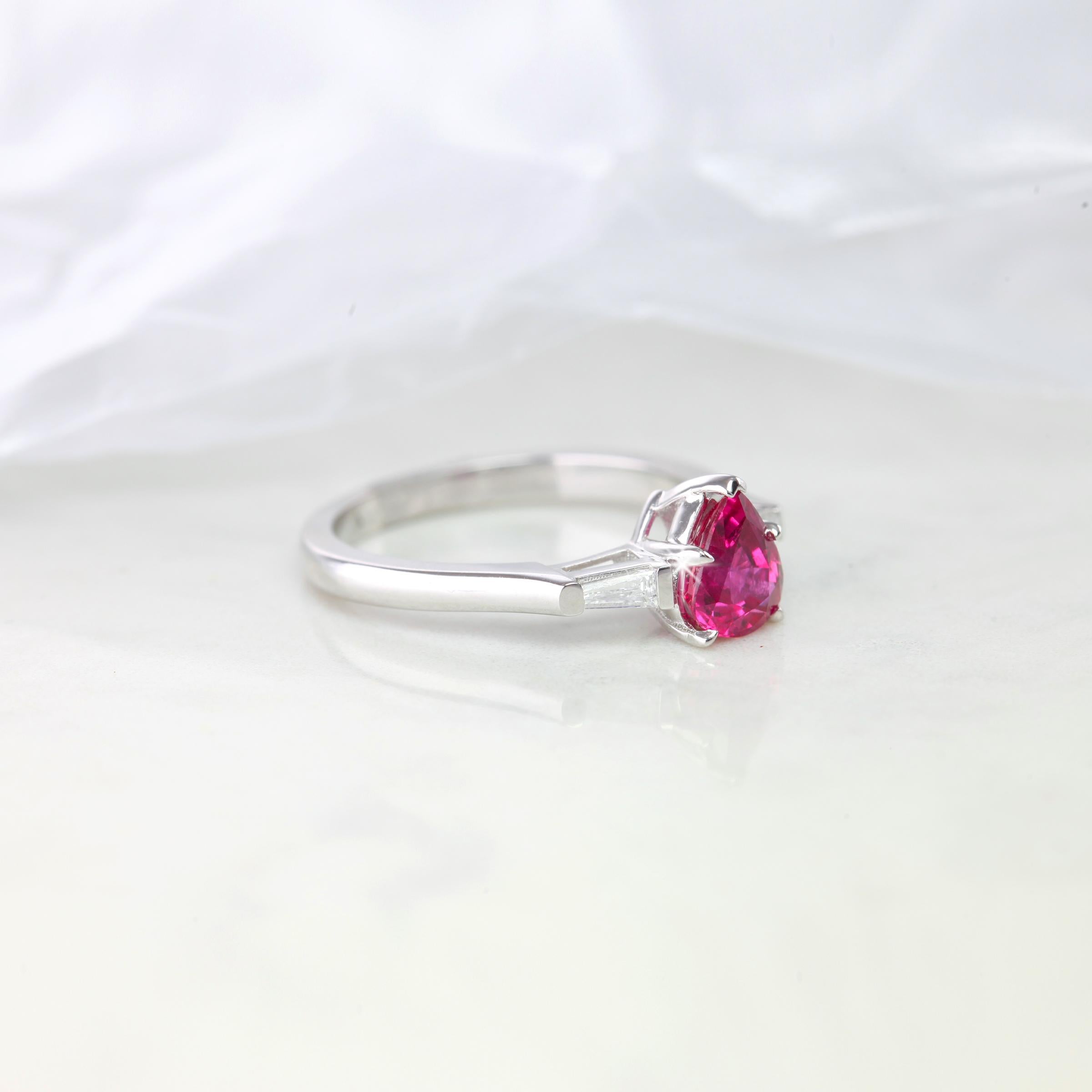 Ruby Ring Pear Shaped Ruby Ring Thai Ruby Ring With Baguette Diomands  14K Solid White Gold 0,15 CT Pear Shaped Ruby With Baguette Diomands Ring created by hands from ring to the stone shapes. 

I used brillant baguette diamonds to reveal a lovely