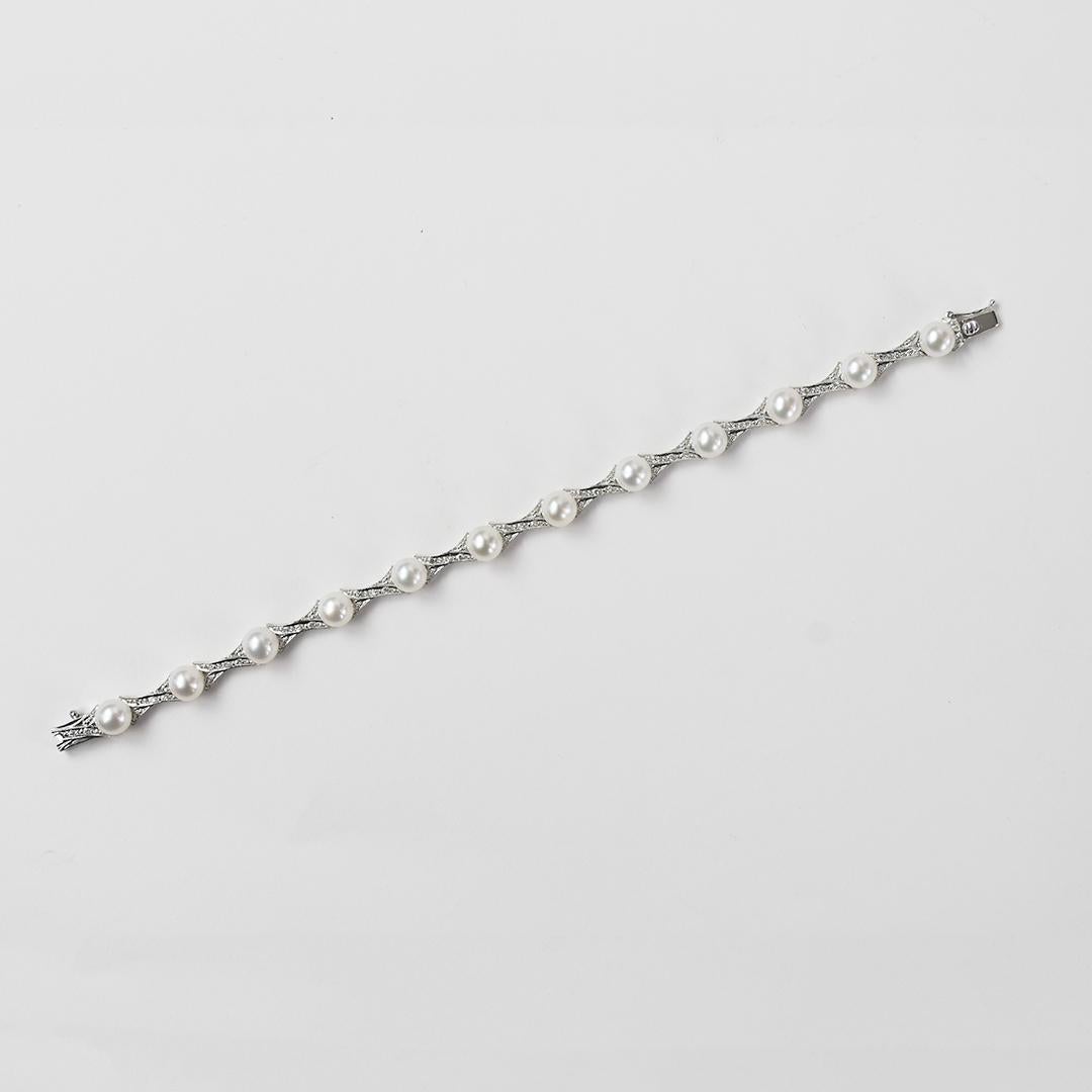 Armband aus 14 Karat Weißgold mit Perlen und Diamanten für Damen oder Herren