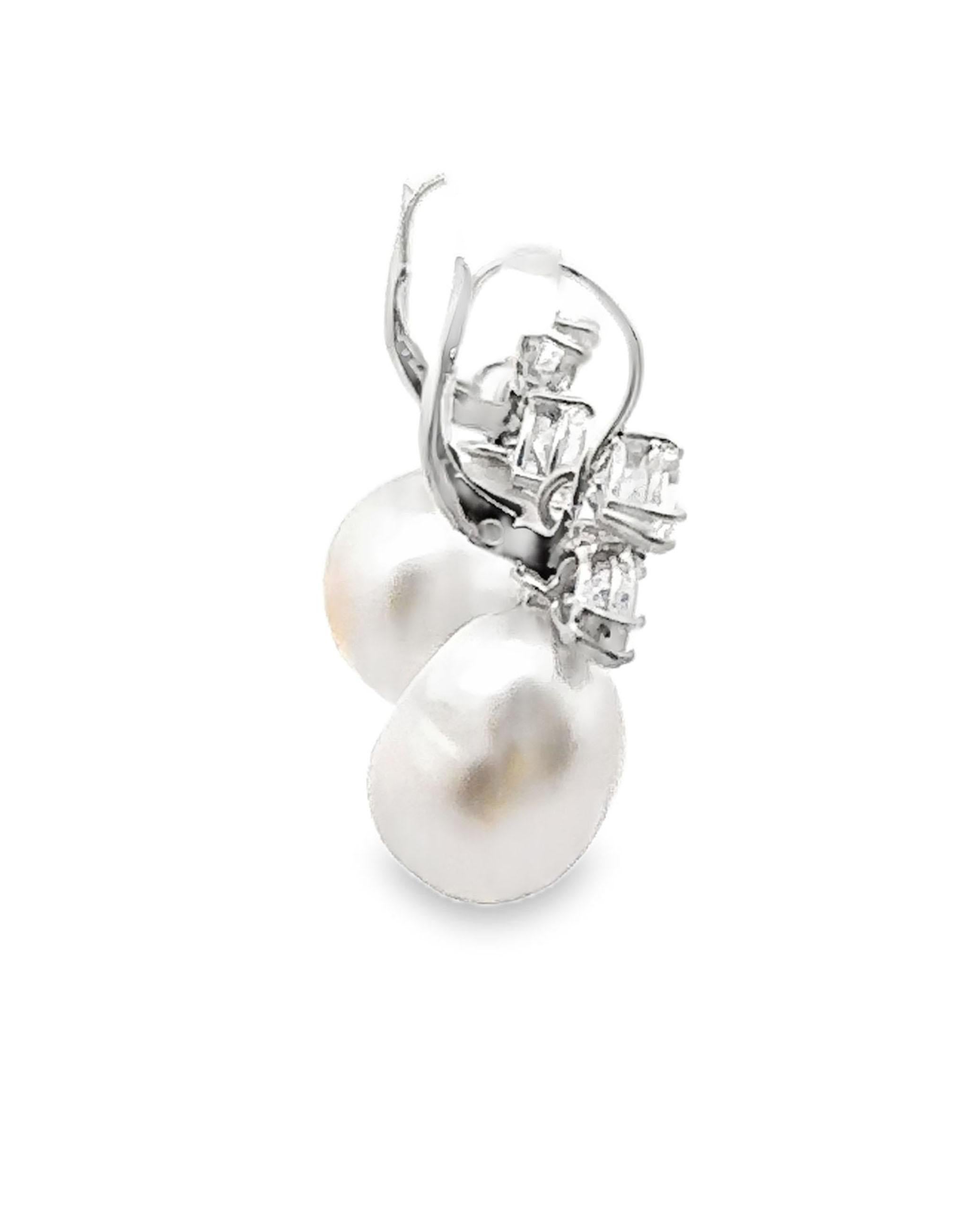 14K white gold semi baroque pearl and diamond drop earrings with 4 marquis and 2 pear shape diamonds weighing approximately 1.60 carats total.

- Pearls measure approximately 12x14.76mm each.
- Diamonds are G/H color, VS2 clarity.
- Lever back