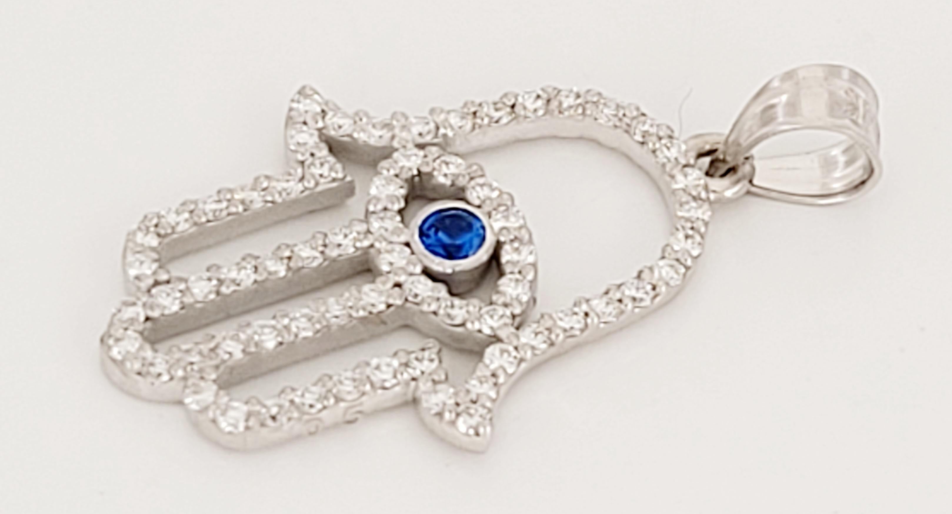 Unbranded Pendant
14K White :Gold 
Sapphire and Diamonds 
Sapphire .08ct 
Diamonds .40ct
Diamond :Clarity VS
Color Grade G
Weight 1.6gr 
Condition new, without tags
Retail Price: $1000