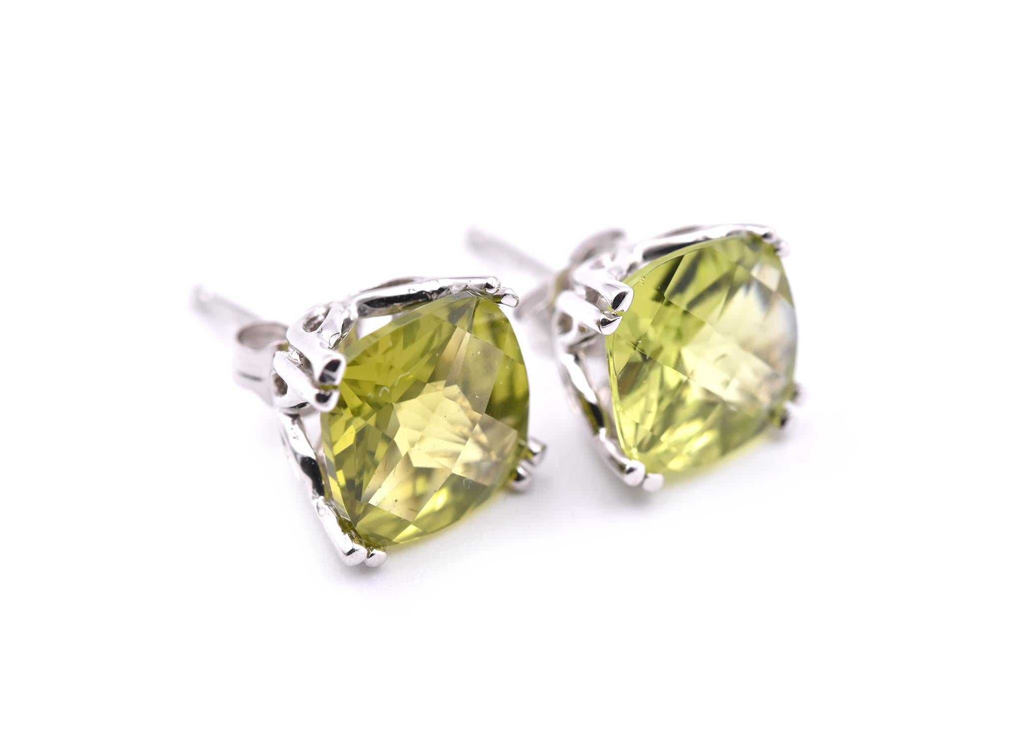 Designer: custom design
Material: 14k white gold
Peridot: 2 cushion cut= 4.70cttw 
Dimensions: earrings measure approximately 7.95mm by 8.25mm
Fastenings: post with friction backs
Weight: 2.1 grams	
