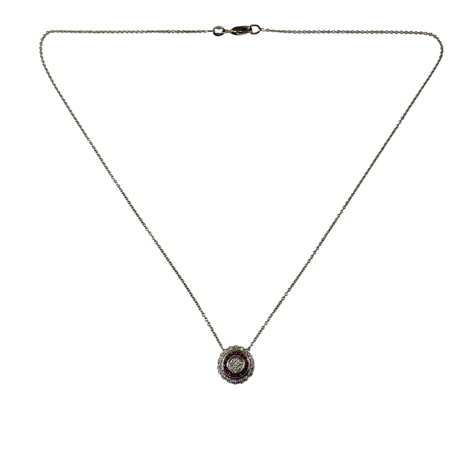 14 karat White Gold Pink Sapphire and Diamond Pendant Necklace JAGi Certified-

This stunning pendant necklace features 16 round natural pink sapphires and 26 round brilliant cut diamonds set in 14K white gold.

Approximate total sapphire weight: 