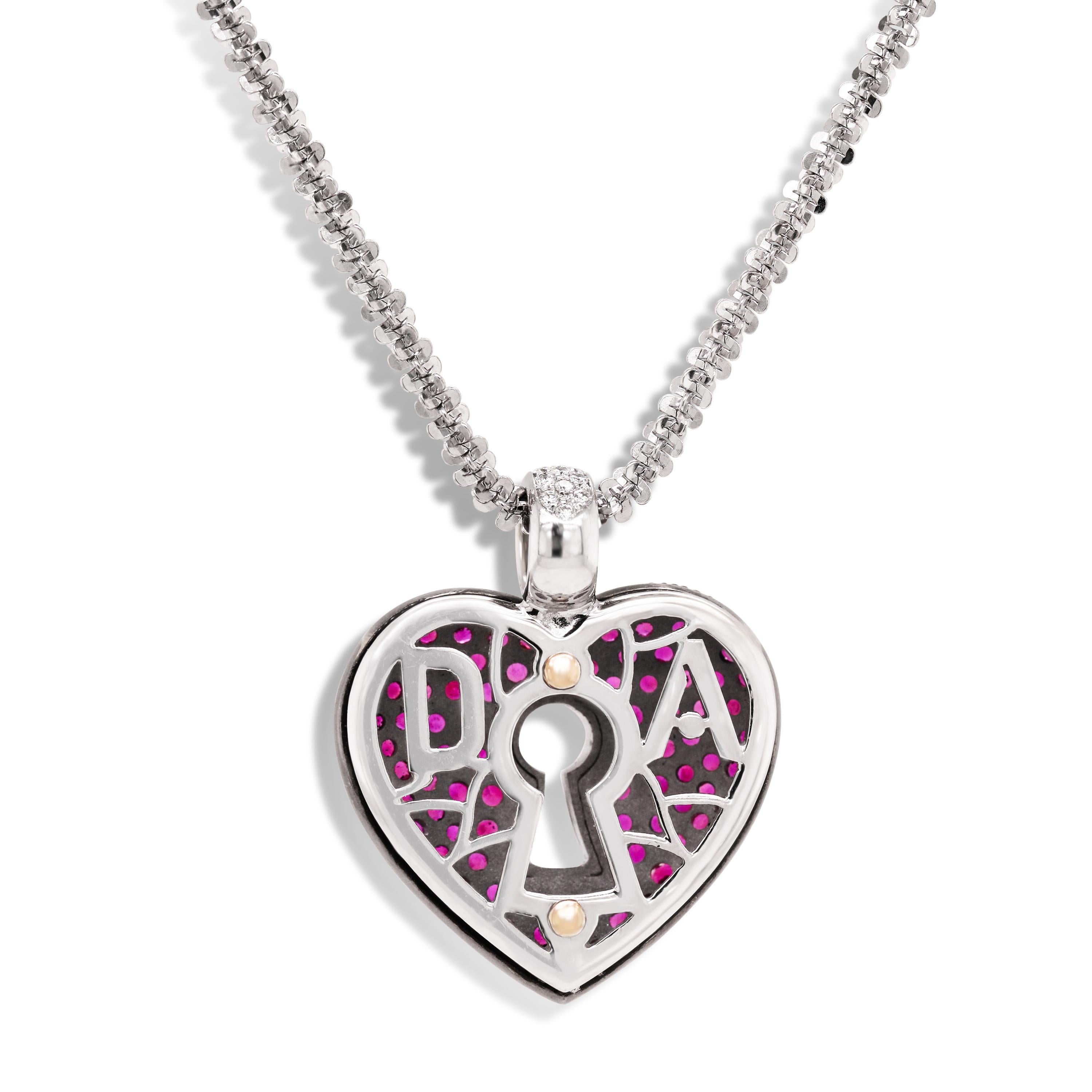 14K White Gold Pink Sapphire Diamond Heart Pendant Diamond Cut Chain Necklace

This gorgeous one-of-a-kind piece features a pink-sapphire set heart pendant with diamonds on the bail and center. The back of the pendant is stamped by a designer, 