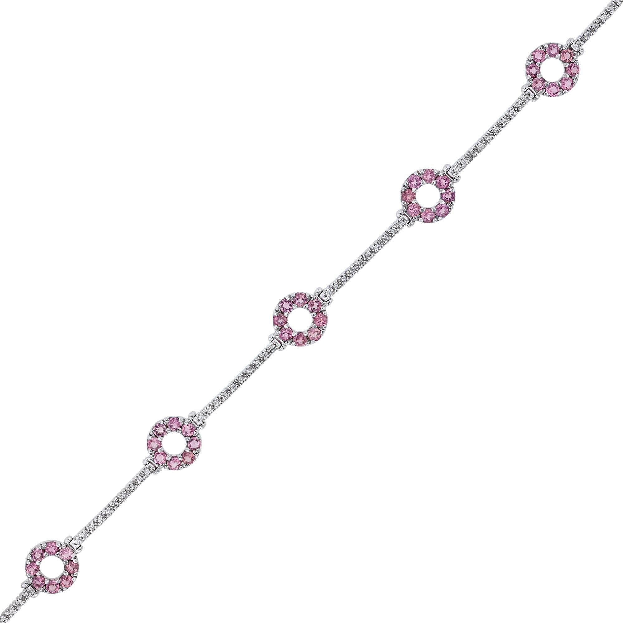This bracelet is made in 14K white gold and features 52 round cut diamonds weighing 0.26 carats. With five round links of 40 pink tourmalines weighing 3.20 carats. All stones are prong set.