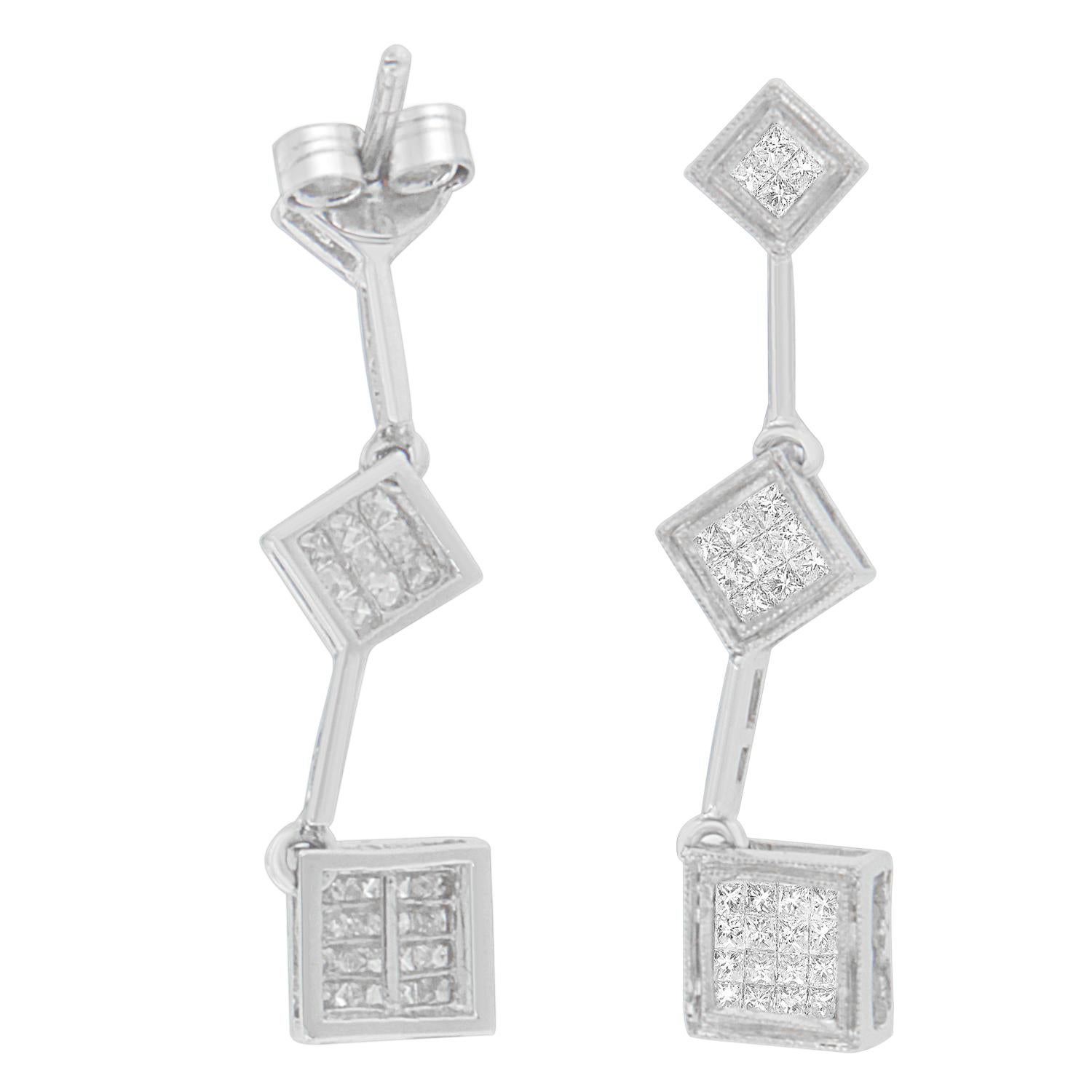 Designed to overwhelm, these stunningly designed diamond earrings are certain to make a magnificent addition to your wardrobe. Composed of 14 karats white gold, the earrings are buffed to shine high and features trio of square accents. The elegant