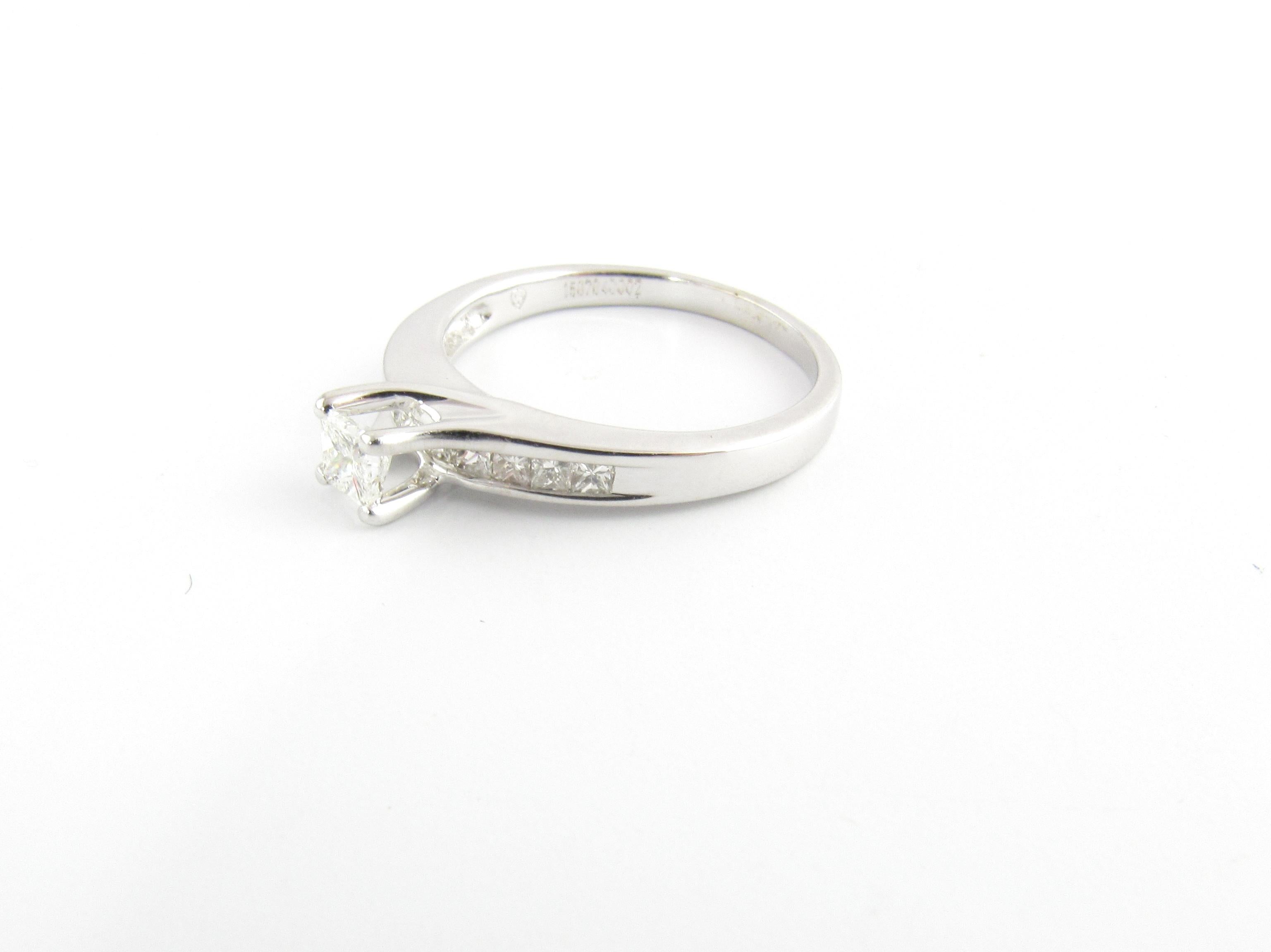 14K White Gold Princess Cut Diamond Engagement Ring 

Center princess cut diamond with 10 princess side diamonds.

Size 8 1/4.

Marked: 14K, maker's logo

Ring weight: 3.7g  2.3dwt

EGL Certified:

3.74 x 3.68 x 2.80 MM

Diamonds : Center is .32