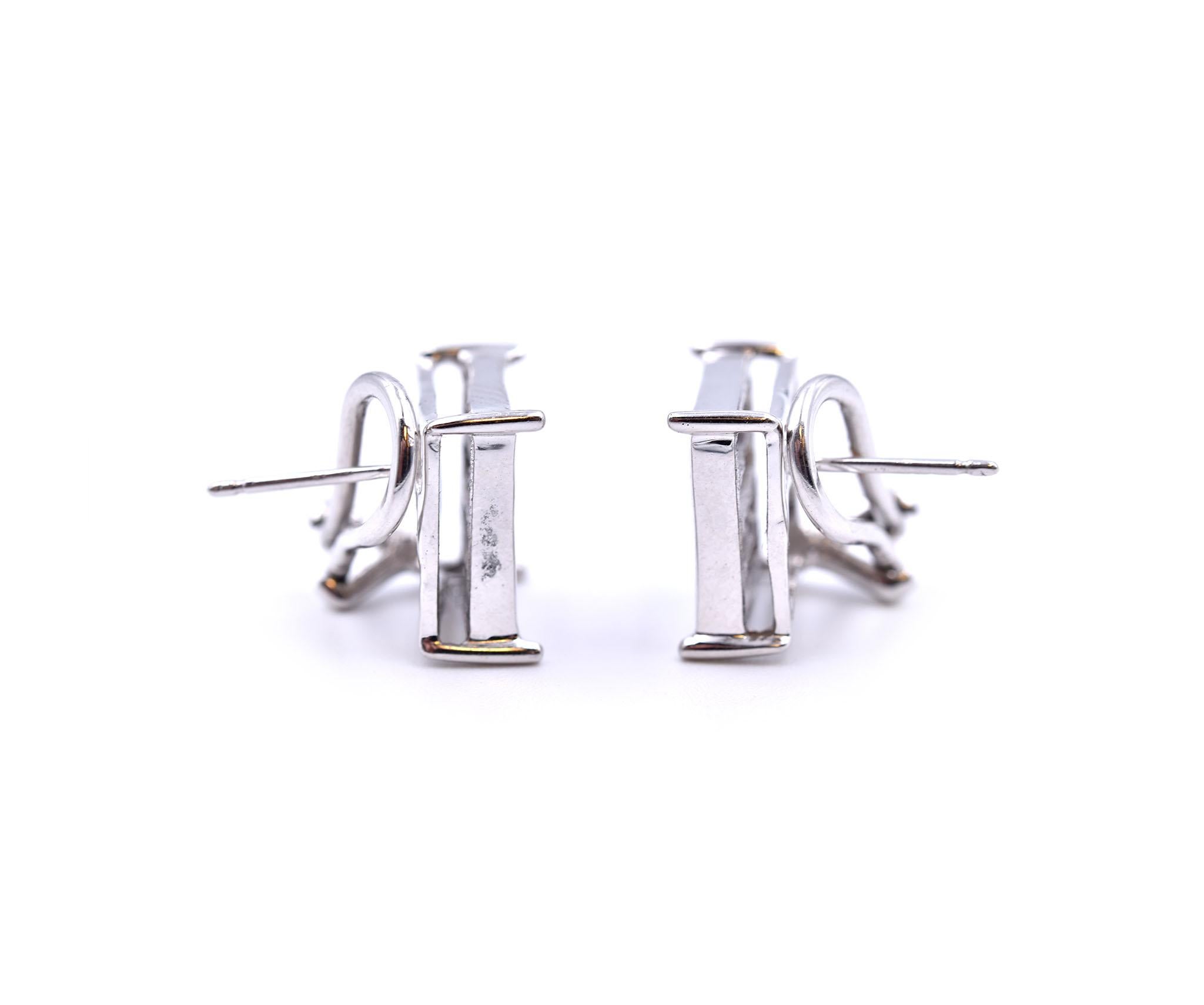 Designer: custom designed
Material: 14k white gold
Diamonds: 32 princess cuts = 3.20cttw
Color: H
Clarity: SI1
Dimensions: earrings measure 12mm by 12mm
Fastenings: post with omega back
Weight: 5.7 grams
