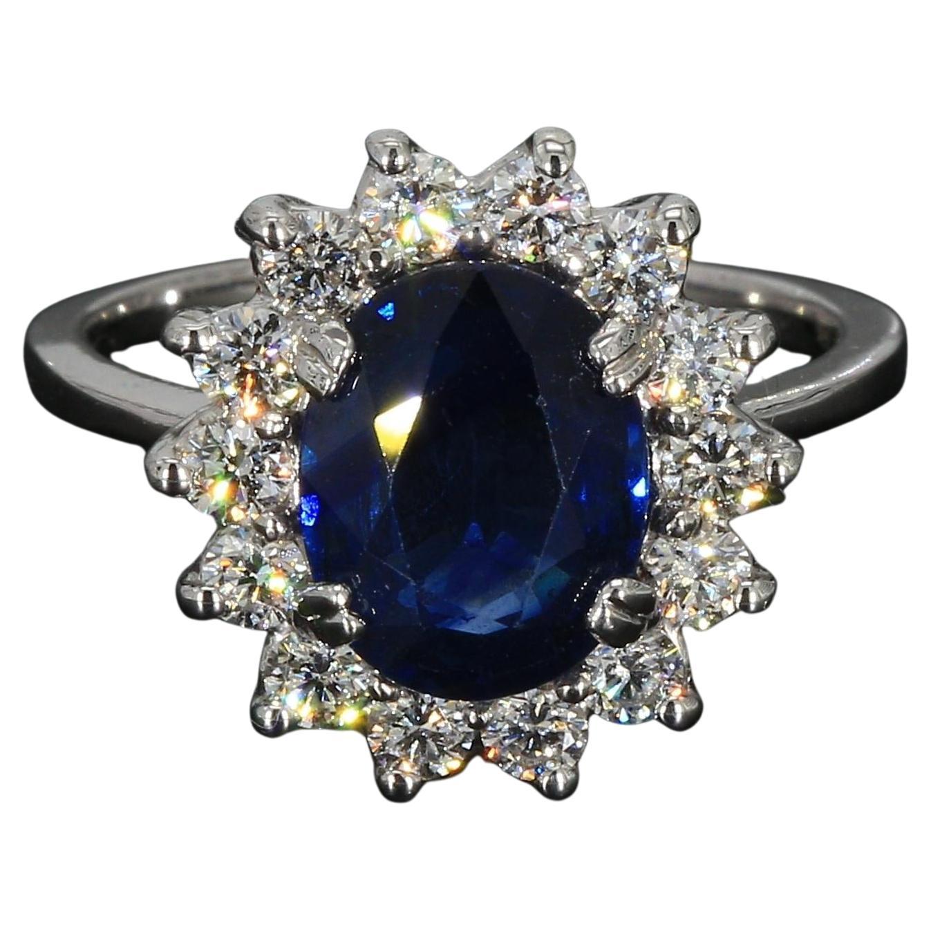 14k White Gold "Princess Diana" Diamond Halo Ring with Blue Sapphire - Size 5