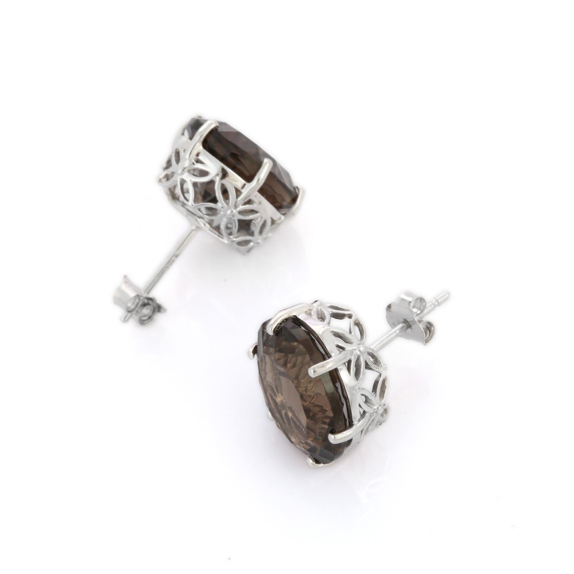 Studs create a subtle beauty while showcasing the colors of the natural precious gemstones making a statement.
Oval cut smoky quartz studs in 14K gold. Embrace your look with these stunning pair of earrings suitable for any occasion to complete your