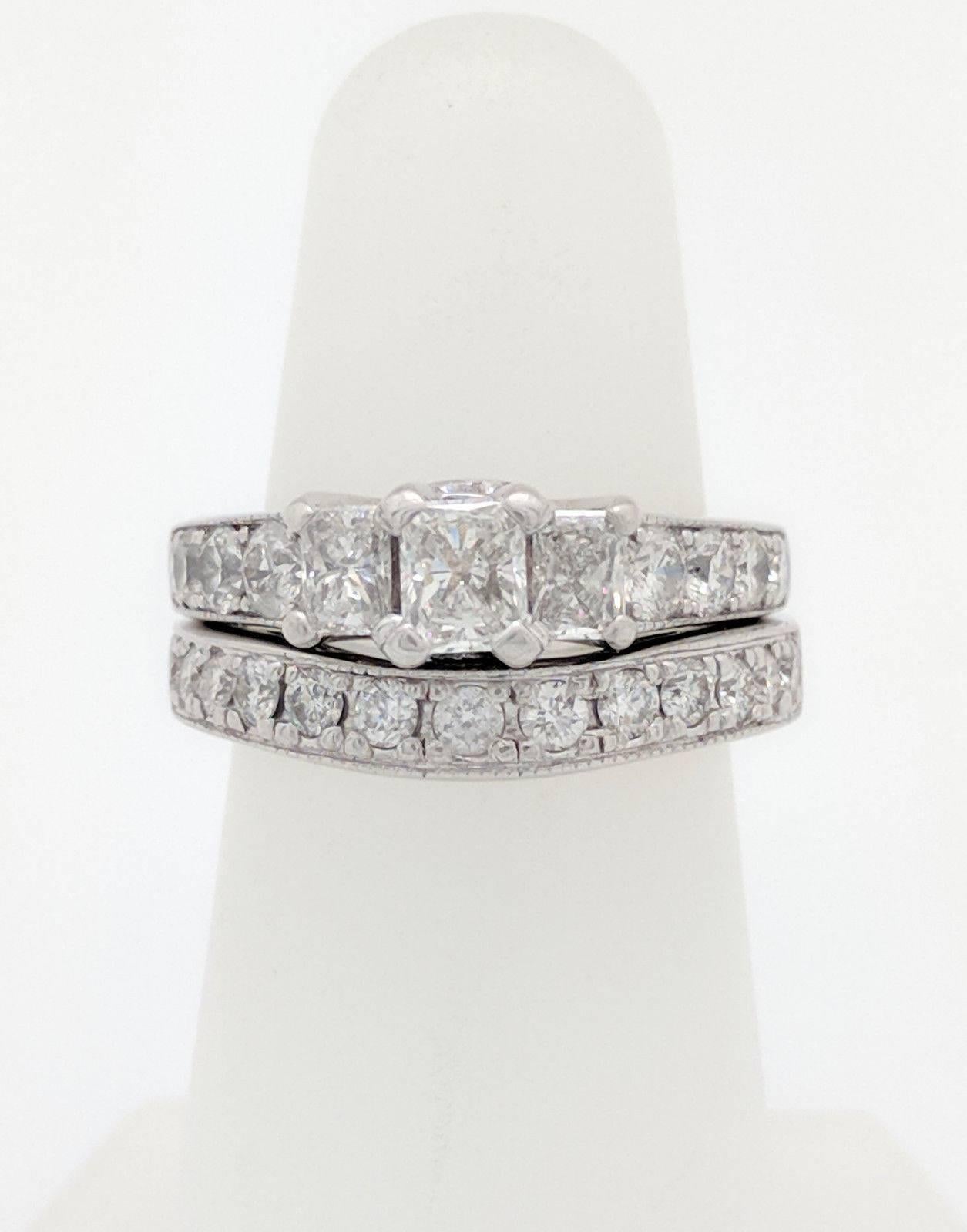 14K White Gold Radiant Cut 3-Stone 2.15CTW Diamond Engagement Ring

You are viewing a beautiful 3-Stone Diamond Engagement Ring with Matching Band. The engagement ring features (1) .35ct natural radiant cut diamond, (2) .20ct radiant cut diamonds