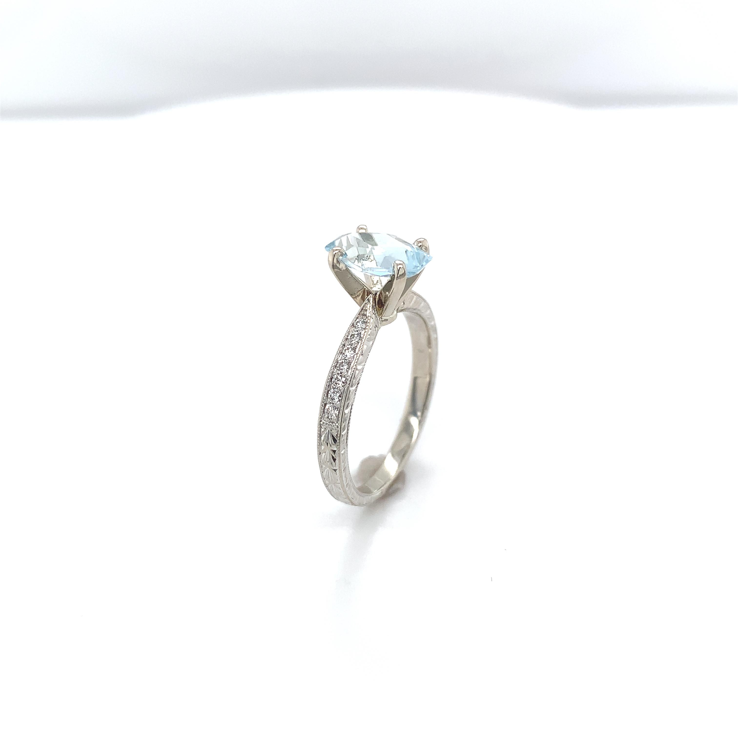 Contemporary 14K White gold Ring featuring a Specialty Cut Aquamarine Hand Engraved For Sale