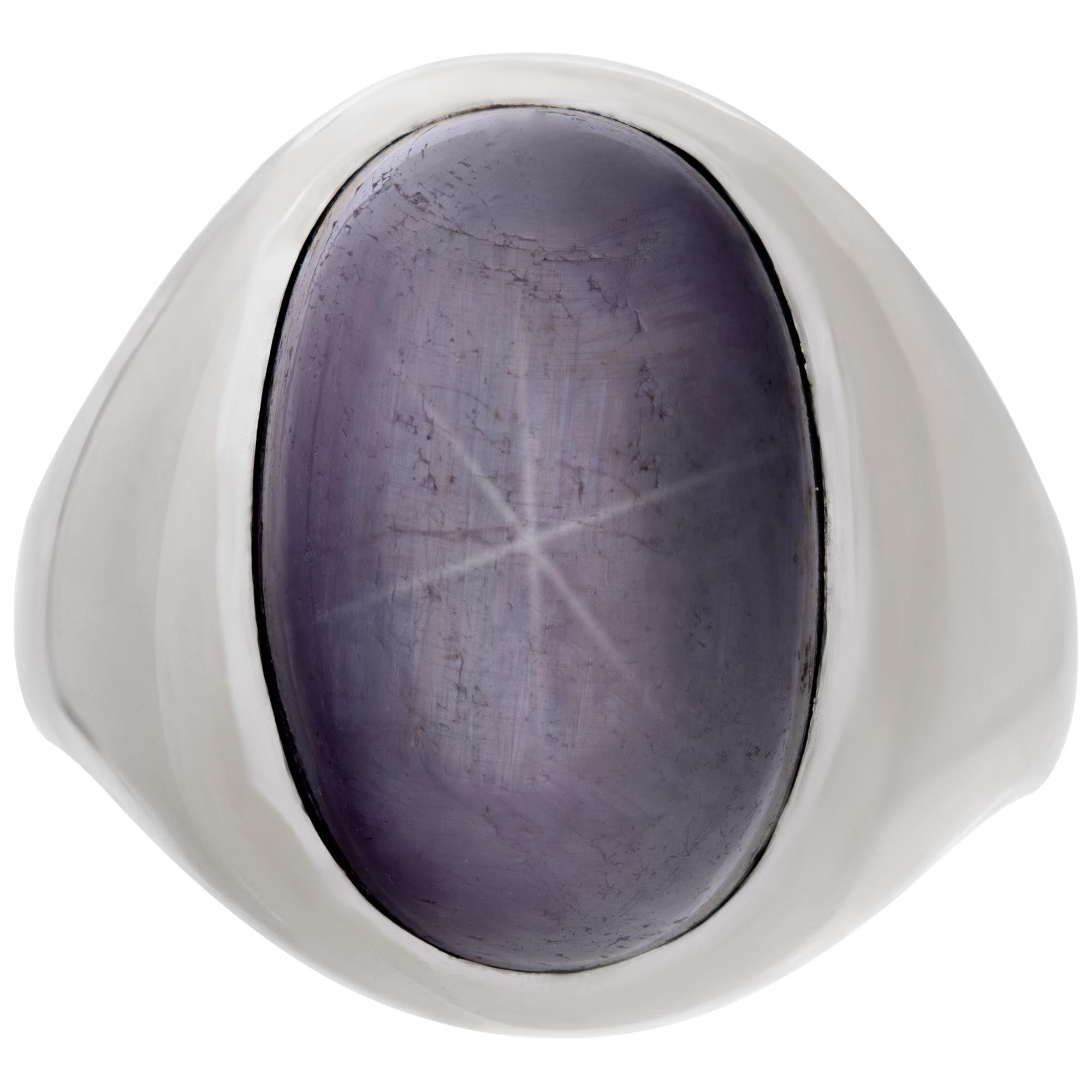 Oval cabochon plum star-sapphire ring set in 14k white gold; size 5This Sapphire ring is currently size 5 and some items can be sized up or down, please ask! It weighs 10.9 pennyweights and is 14k White Gold.
