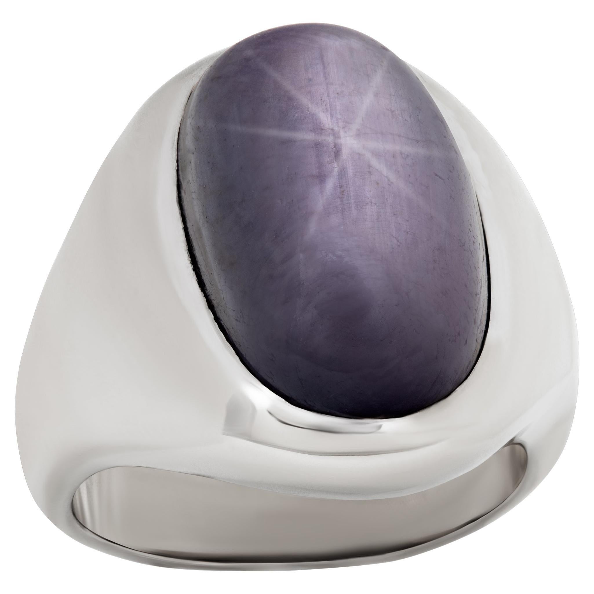 Oval cabochon plum star-sapphire ring set in 14k white gold; size 5This Sapphire ring is currently size 5 and some items can be sized up or down, please ask! It weighs 10.9 pennyweights and is 14k White Gold.
