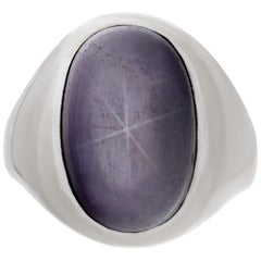 Bague en or blanc 14k cabochon prune étoile saphir cabochon ovale 