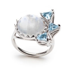 14k White Gold Ring set with a Moonstone Cabochon and Triangular Aquamarines