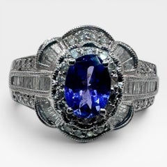 Anillo de Oro Blanco de 14K con 0,75Ct. Tanzanita y diamantes 1,60 ct. (Talla 9.00)