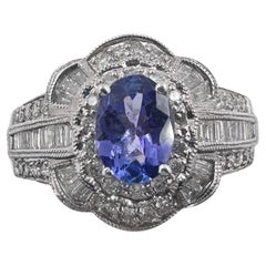 Anillo de Oro Blanco de 14K con 0,75Ct. Tanzanita y diamantes 1,60 ct. (Talla 9.00)