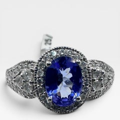 Bague en or blanc 14K avec 1.25Ct. Tanzanite et diamants 1.08 Ct. (Taille 9.25)