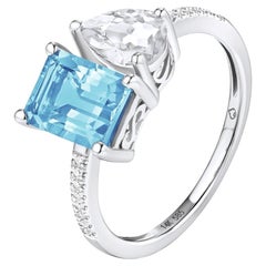 14K White Gold Ring with 2.05 Carat Blue Topaz and White Topaz with Diamonds