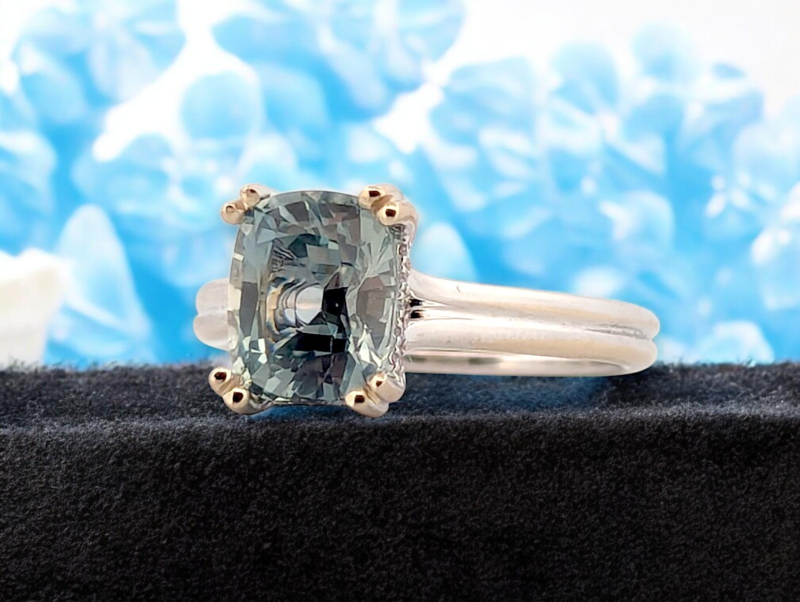 Elegant and modern, the Liana ring features a vivid 2.50ct natural sapphire set in lustrous 14K white gold. A delicate 0.08ctw hidden halo of natural diamonds adds discreet sparkle beneath the crown, creating depth and radiance with every