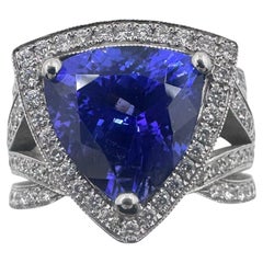Anillo de Oro Blanco de 14K con 4,95Ct. Tanzanita y diamantes 1,30 ct. (Talla 6.00)