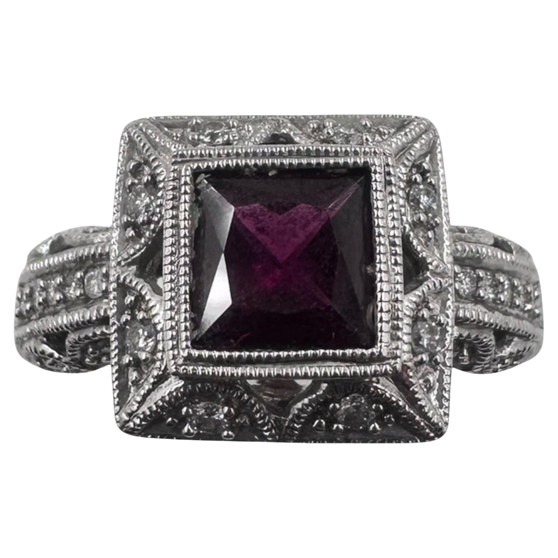 14K White Gold Ring with Garnet and Diamonds. (Size 7.75)