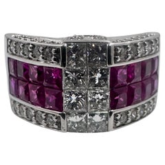 14K White Gold Ring with Princess Cut Rubies and Diamonds. (Size 7.75)