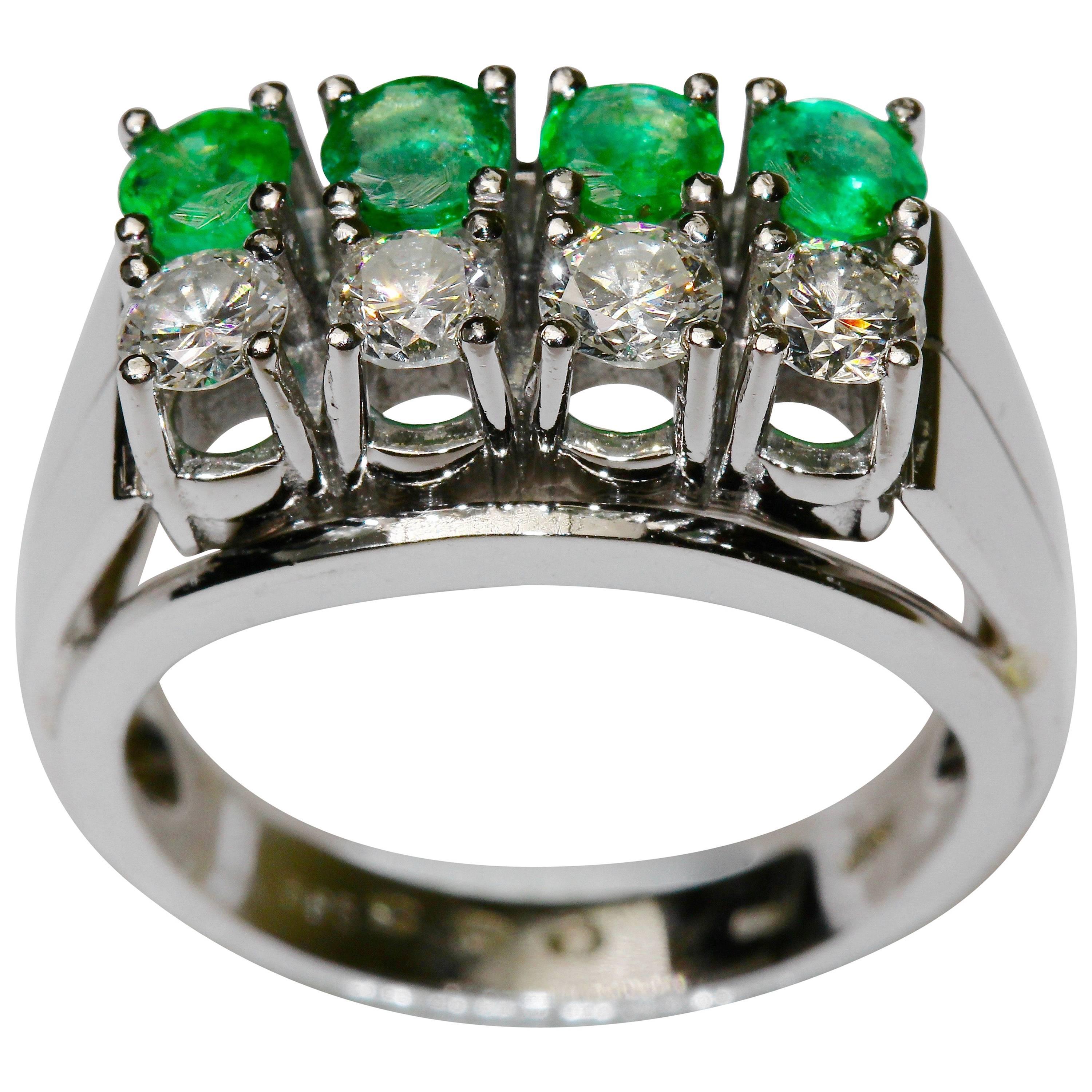 14K white gold ring with round diamonds and emeralds