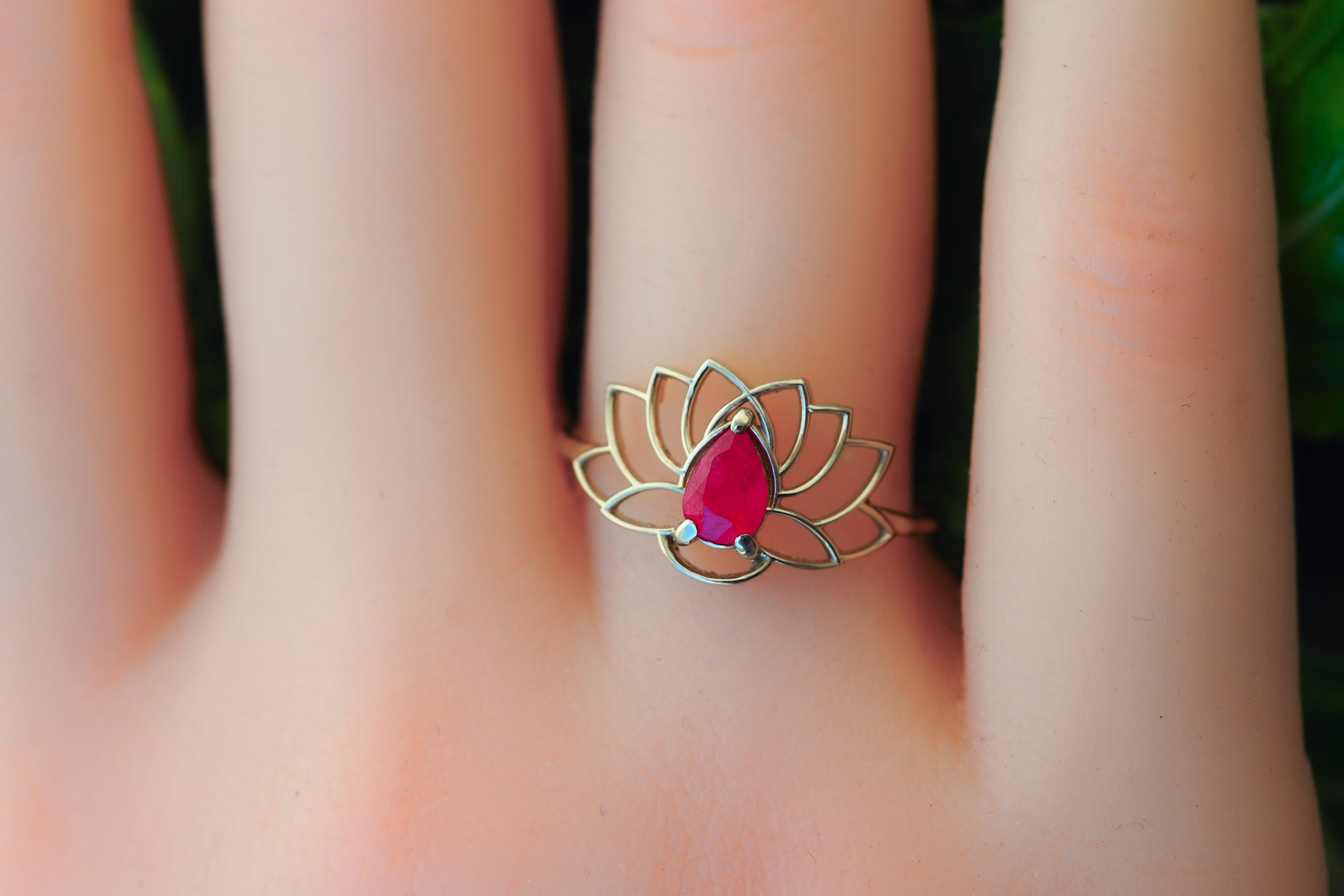 For Sale:  Pear ruby ring in 14 karat gold. Lotus ring with ruby 10