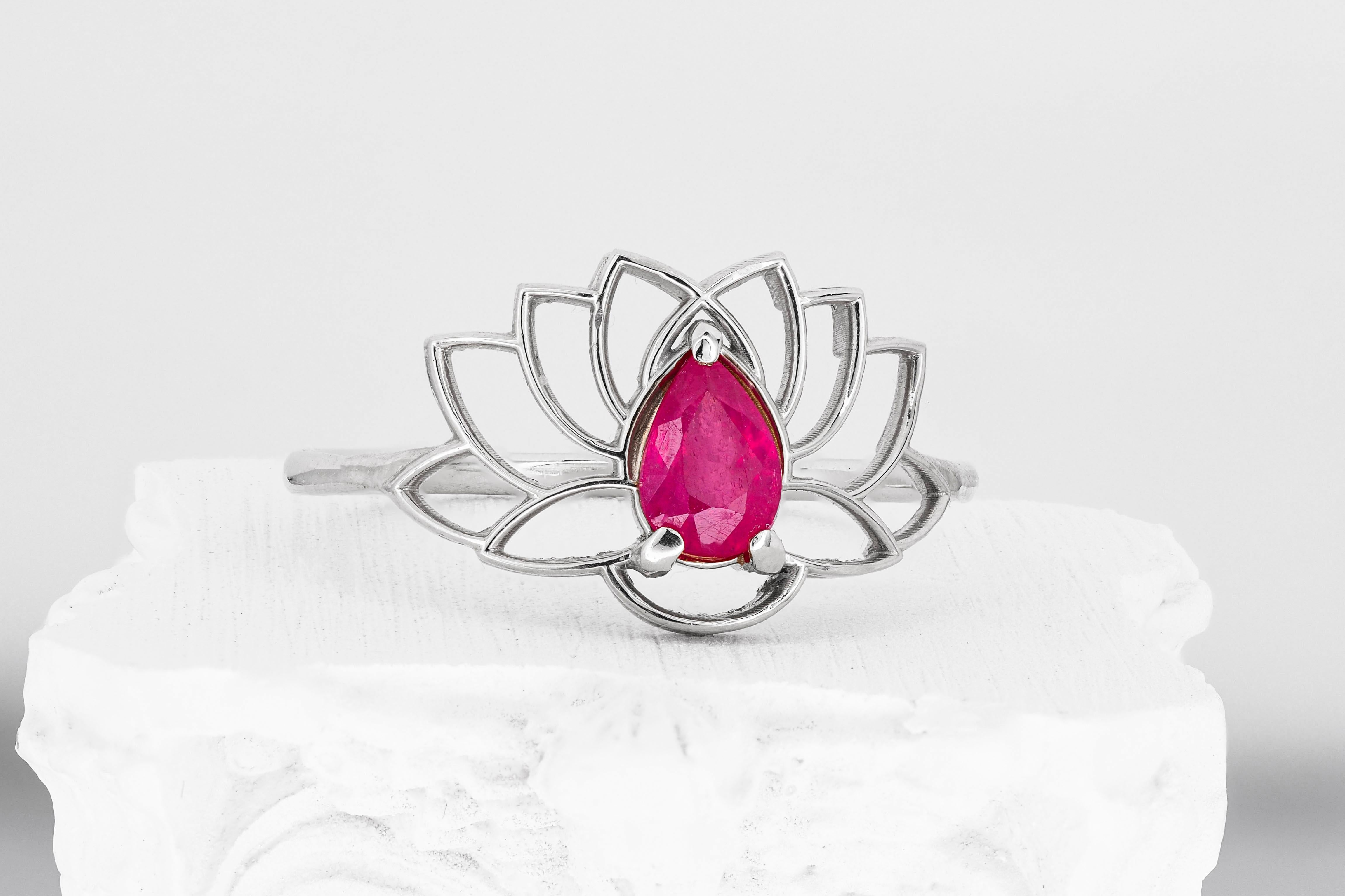 For Sale:  Pear ruby ring in 14 karat gold. Lotus ring with ruby 8