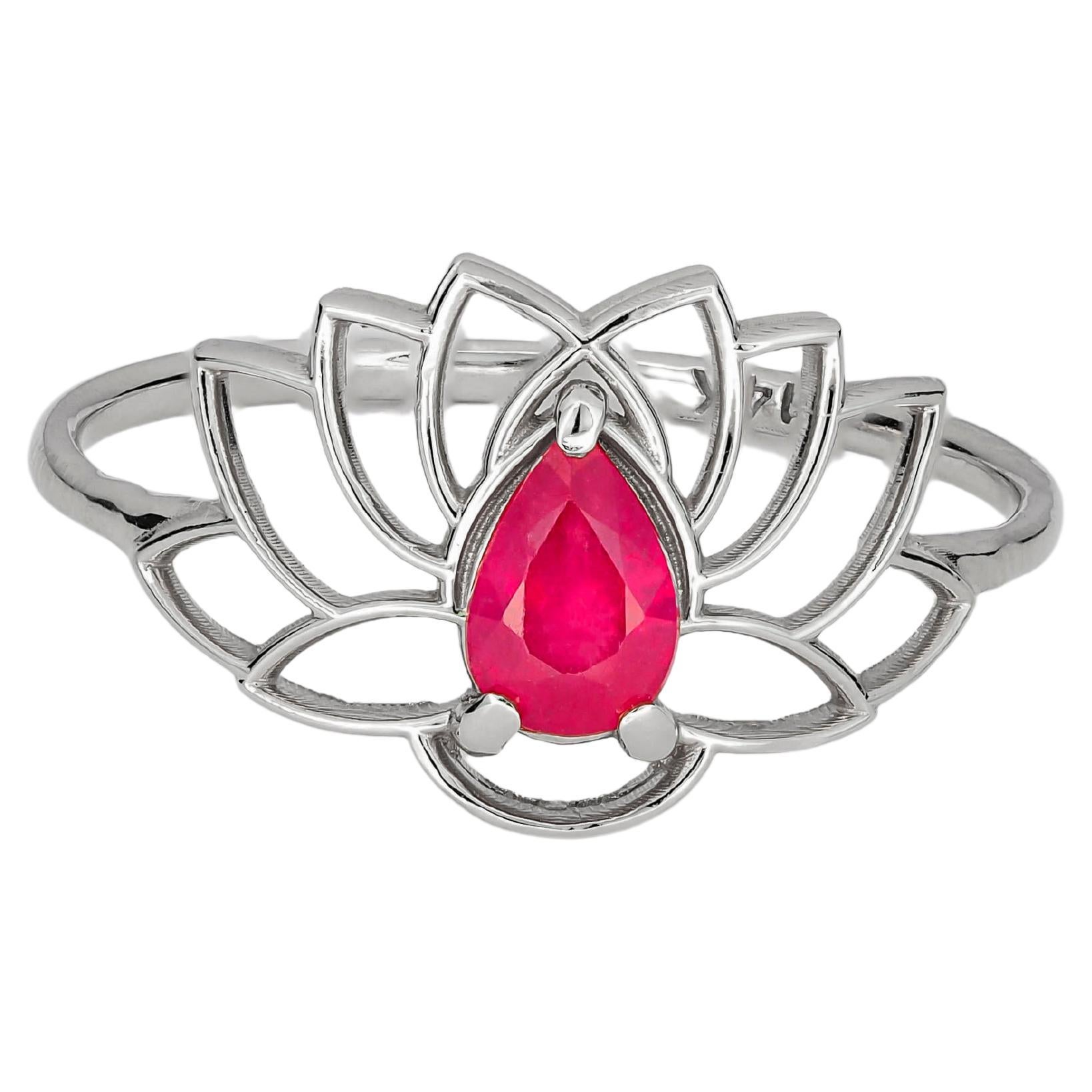 For Sale:  Pear ruby ring in 14 karat gold. Lotus ring with ruby