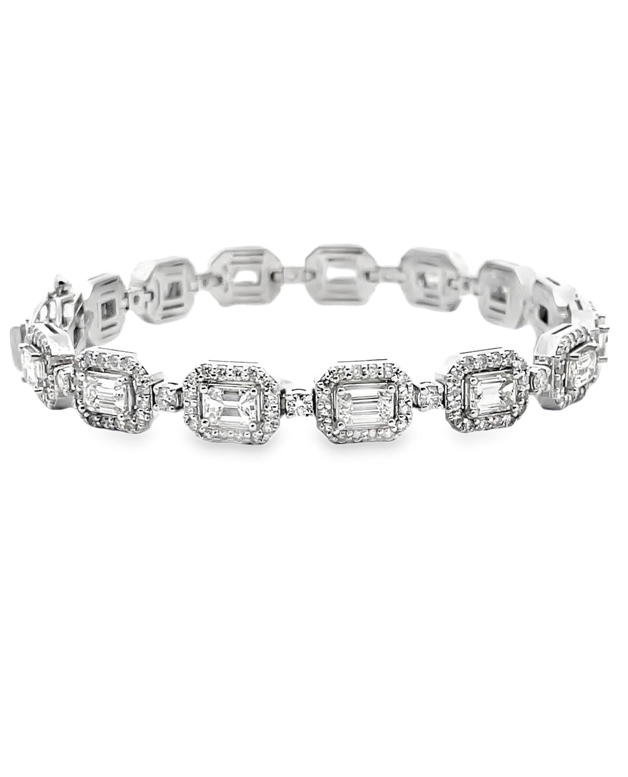 14K white gold diamond bracelet furnished with 255 round brilliant-cut diamonds weighing 3.03 carats total and 15 emerald-cut diamonds weighing 4.75 carats total.

- Bracelet is 7 inches
- Emerald cut diamonds are H color, VS2 clarity.
- Round