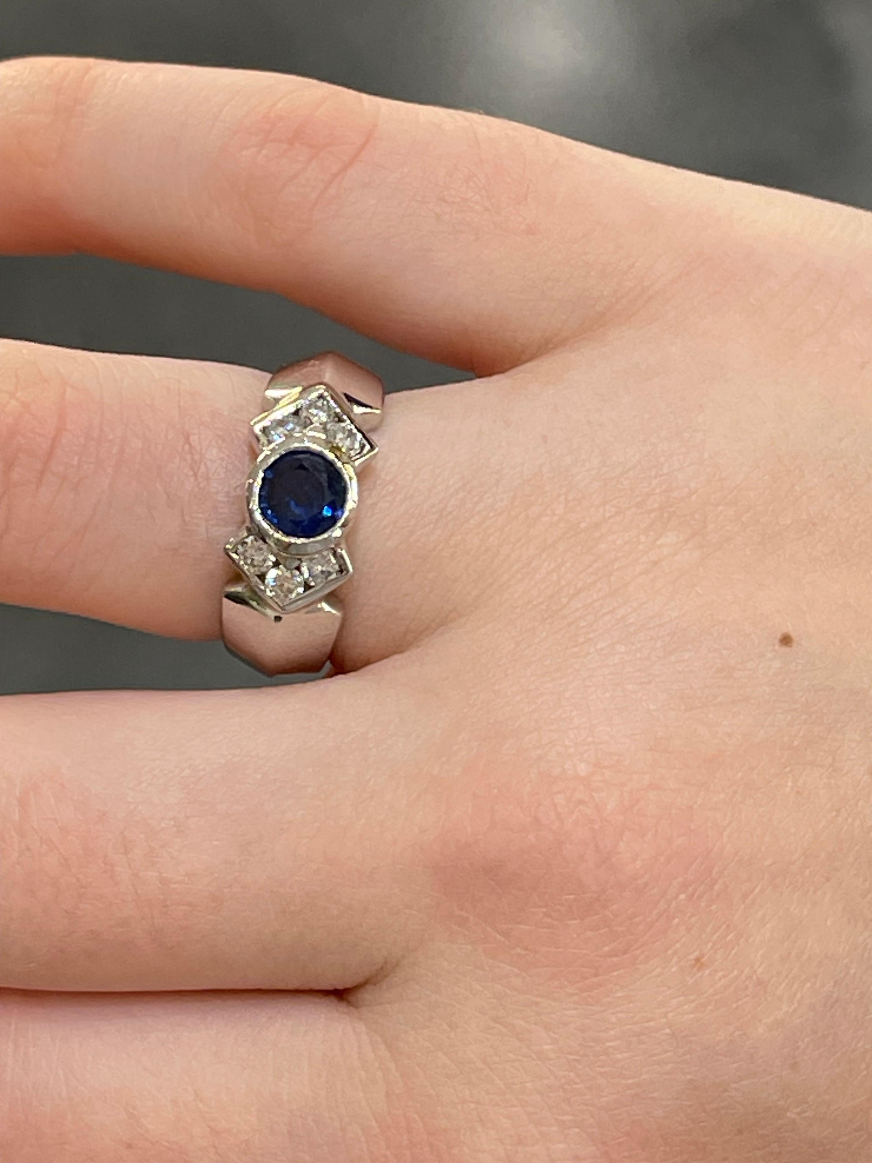 14K White Gold Round Bezel .60 CT Sapphire and .50 CTW Diamond Ring In Excellent Condition For Sale In Stuart, FL
