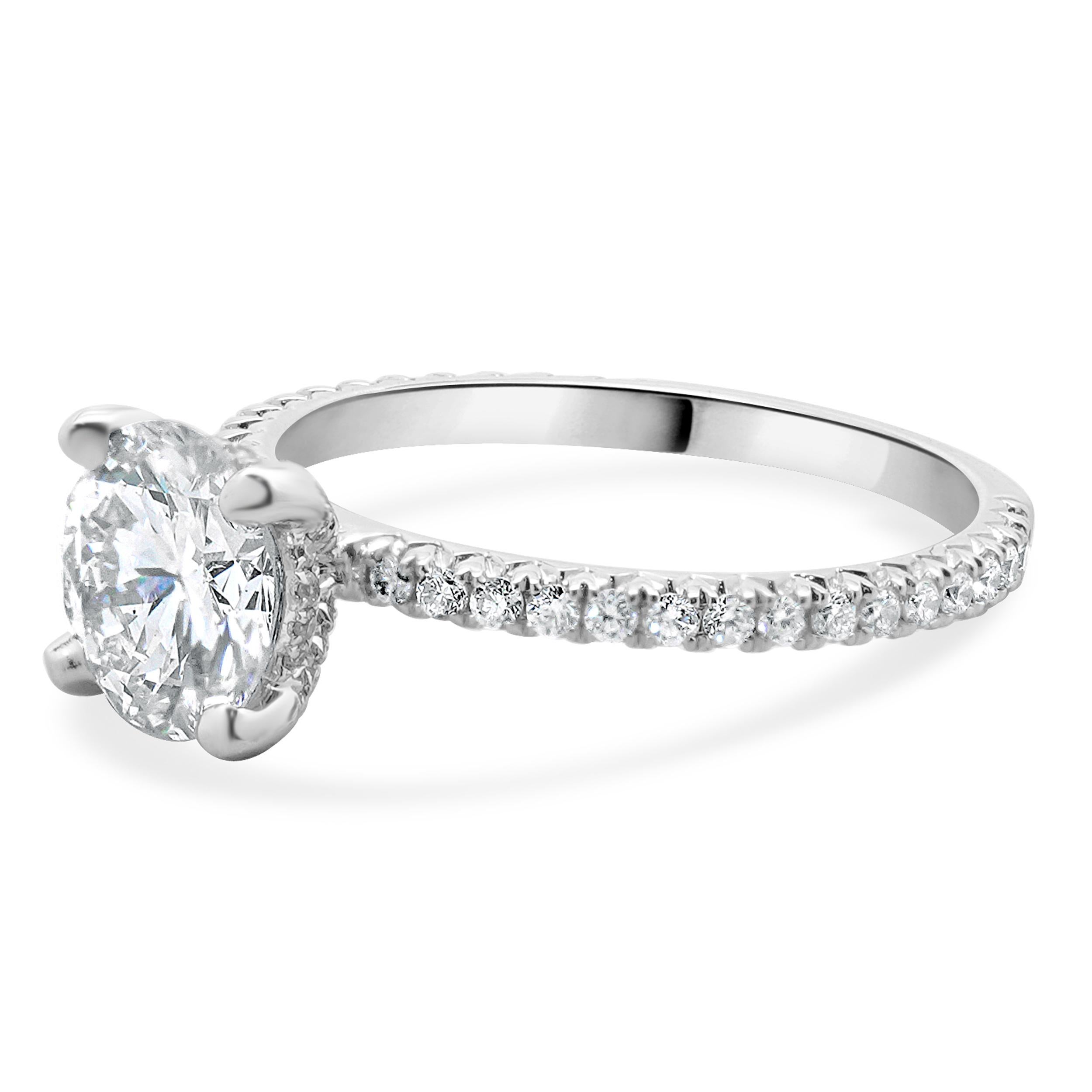Designer: custom
Material: 14K white gold
Diamond: 1 round brilliant cut = 1.50ct
Color: J
Clarity: I1
Diamond: round brilliant = 0.41cttw
Color: G
Clarity: SI1
Ring Size: 6.5 (complimentary sizing available)
Weight: 2.53 grams
