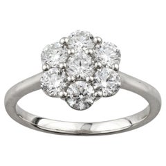 Ring aus 14-karätigem Weißgold mit Diamanten im Rundschliff in Blumenform