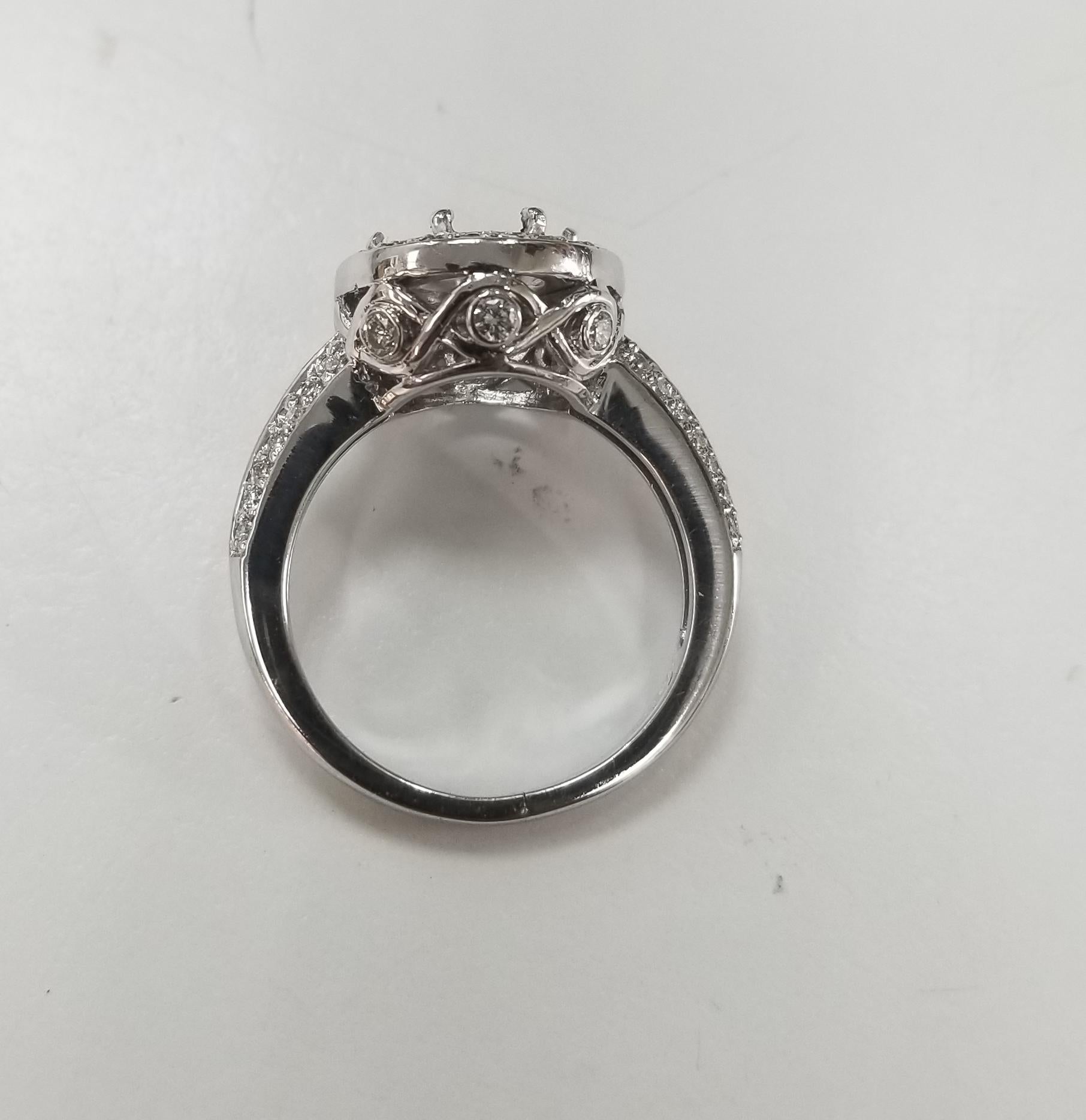 14 Karat White Gold Round Diamond Halo and Knife Edge Ring In New Condition For Sale In Los Angeles, CA