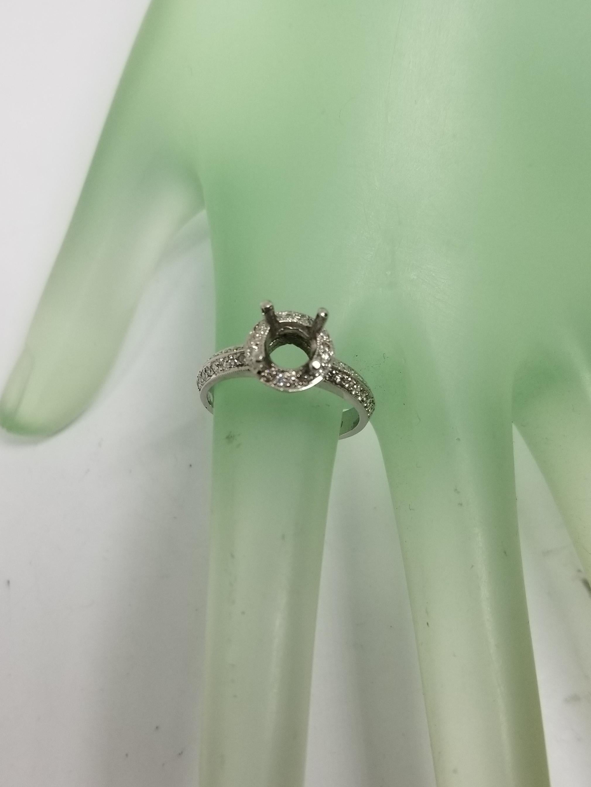 14 Karat White Gold Round Diamond Halo with Knife Edge Ring In New Condition For Sale In Los Angeles, CA