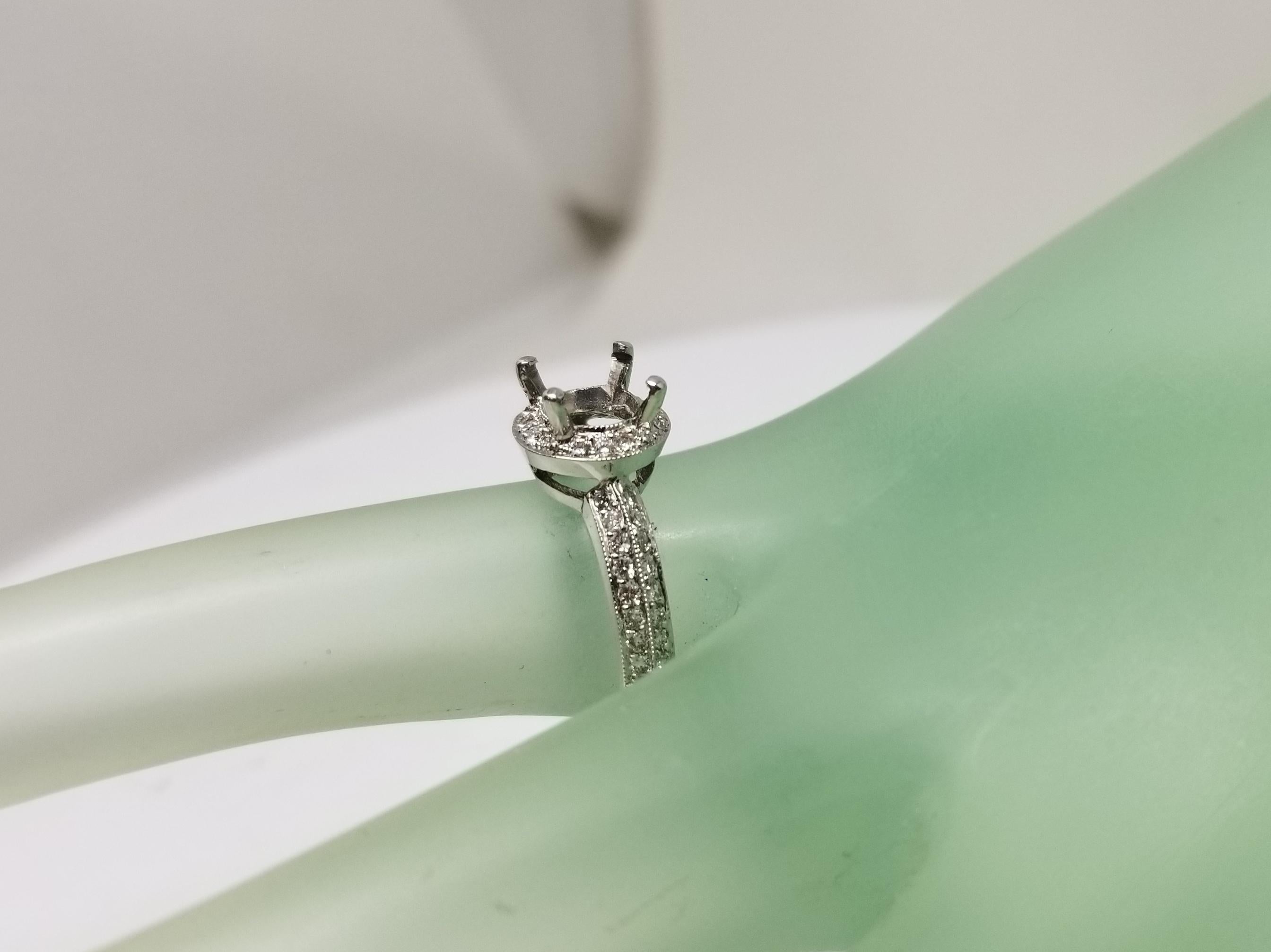 14 Karat White Gold Round Diamond Halo with Knife Edge Ring For Sale 1