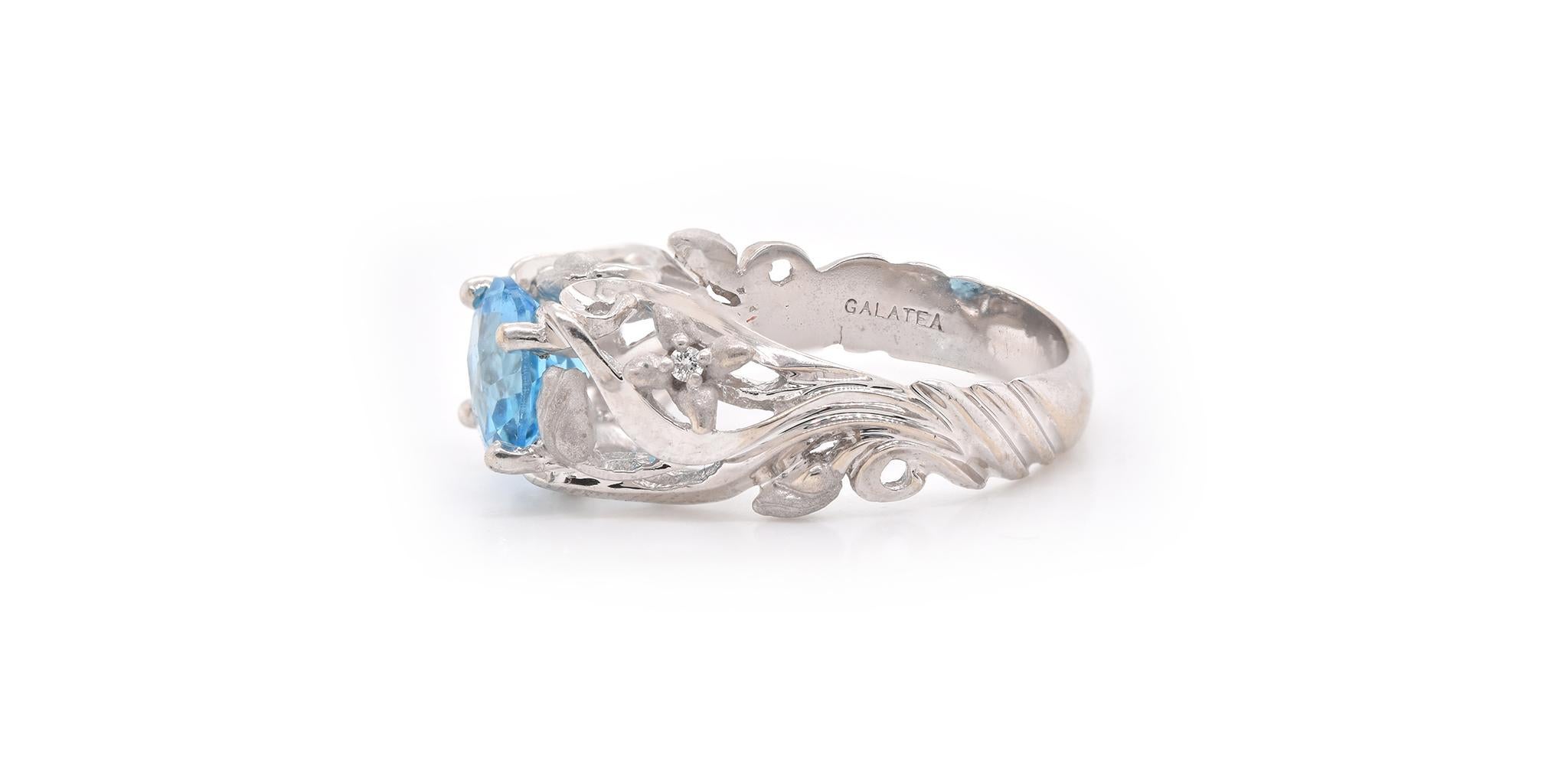 Material: 14k white gold
Topaz: Round faceted blue topaz
Ring size: 6 (please allow two additional shipping days for sizing requests)
Dimensions: Ring top measures 7.45mm – 9.60mm
Weight: 5.1 grams 
