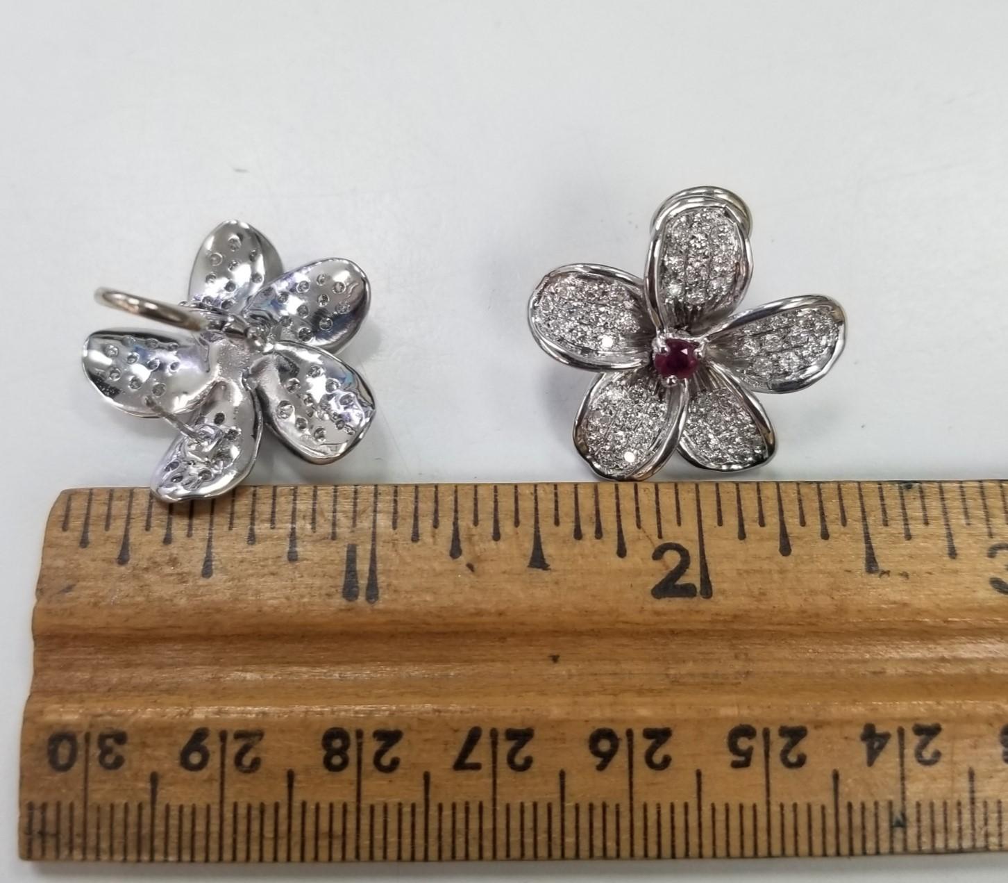 Contemporary 14k White Gold Ruby and Diamond Flower Earrings For Sale