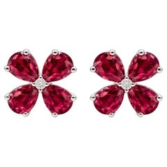 Boucles d'oreilles fleur en or blanc 14K avec rubis et diamants