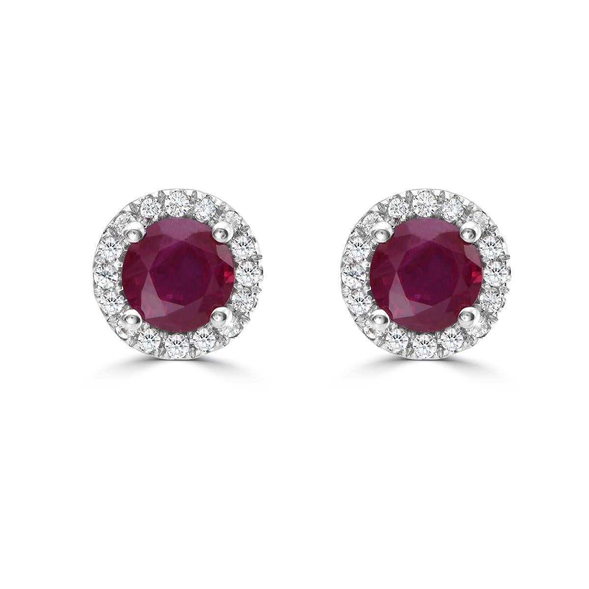 Elevate your look with our exquisite Ruby and Diamond Halo Martini Stud Earrings. The perfect blend of luxury and sophistication, these ruby stud earrings are crafted with stunning diamonds and lustrous gold for a truly exclusive feel. Add a touch